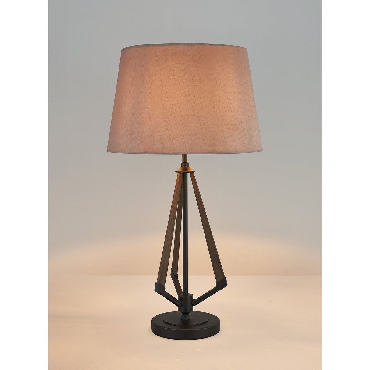 The Hilton 1 Light Wood Table Lamp features a geometric black base with a gold shade, set against a light gray background.