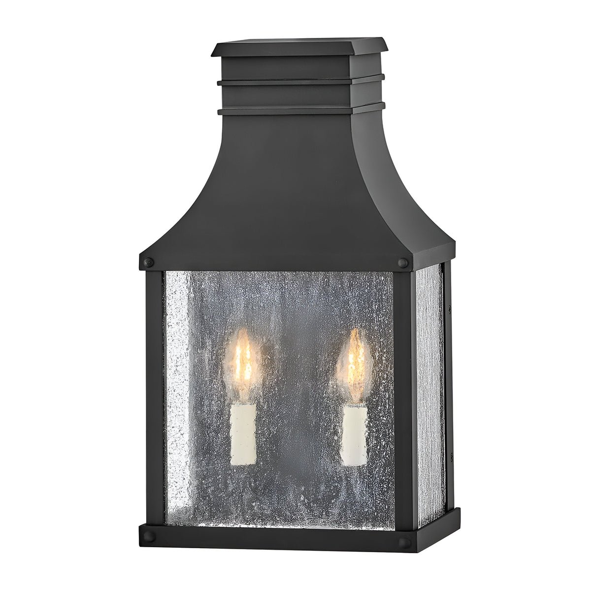 The Beacon Hill 2 Light Outdoor Half Wall Lantern - Black features a museum black aluminum frame that exudes classic charm. Its rectangular design includes a textured glass enclosure with two candle-like bulbs, offering an elegant touch to your exterior space.