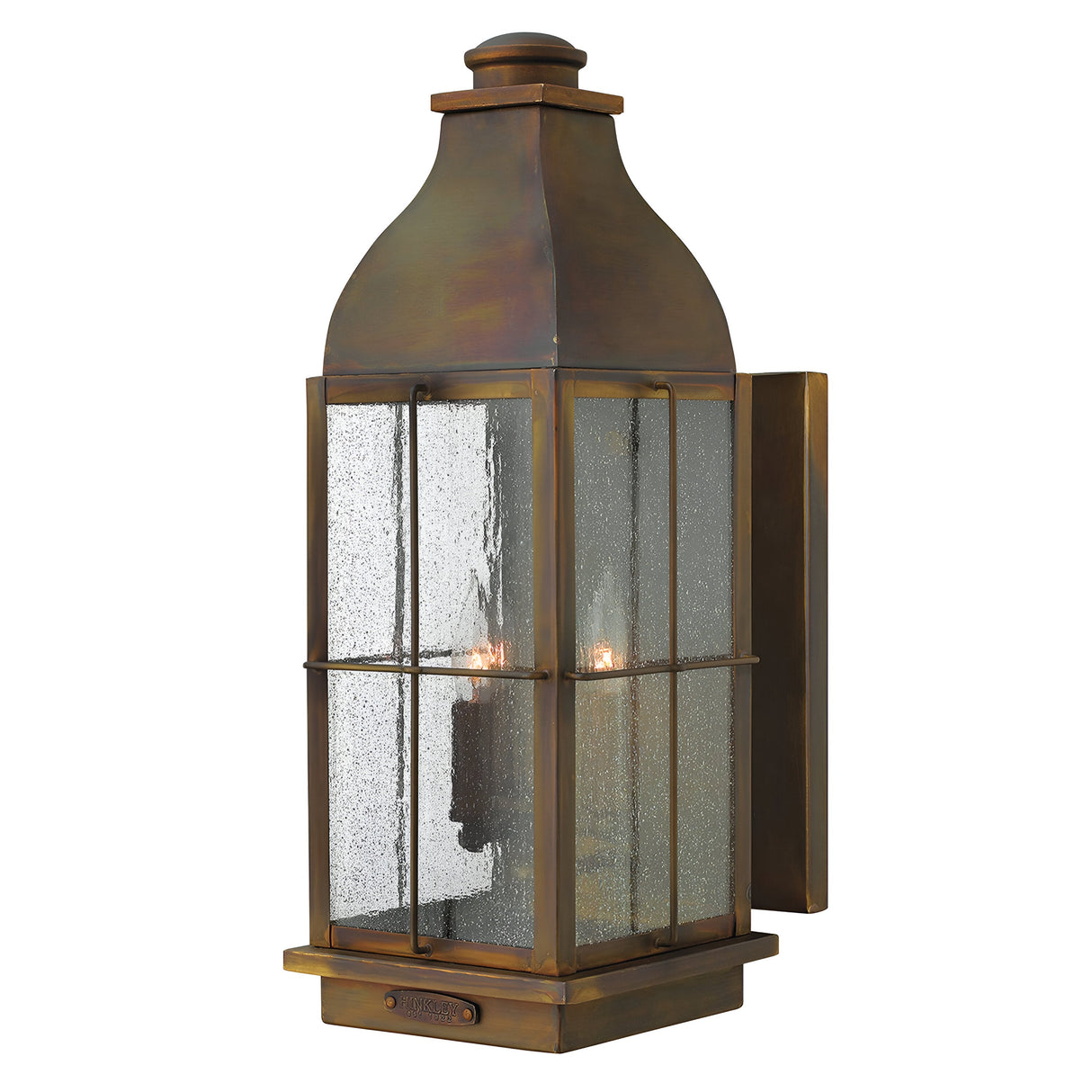 The Bingham 3 Light Outdoor Large Wall Lantern in brown features a vintage-style with a classic rectangular shape and glass panel design. Its weathered finish, clear glass, and metal latticework evoke a nautical aesthetic, giving it an antique appearance.