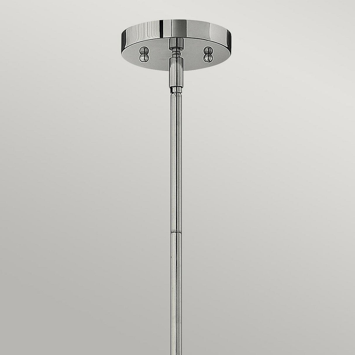 Introducing the Congress 1 Light Clear Glass Pendant - Chrome: a modern and minimalist ceiling mount with a polished chrome finish, featuring a round base and an elegant, slim rod that supports clear glass pendant lights. This sleek metallic design enhances contemporary interior lighting fixtures beautifully.
