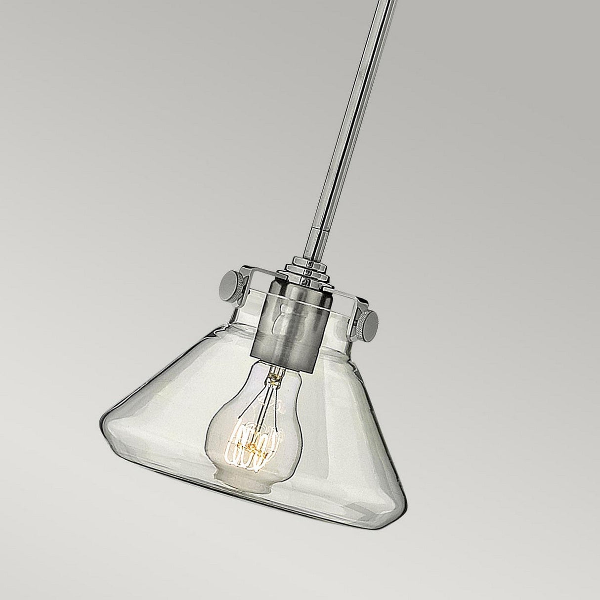 The Congress 1 Light Clear Glass Pendant - Chrome features a modern clear glass design with a visible LED filament bulb, elegantly suspended from a sleek chrome finish metal rod against a plain background.