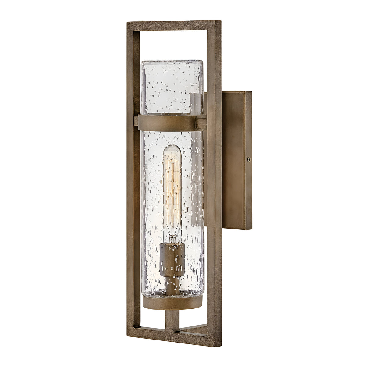 Introducing the Cordillera 1 Light Outdoor Wall Light in Burnished Bronze, this chic fixture boasts a rectangular frame and a clear, textured glass enclosure. It houses a single exposed filament bulb, seamlessly blending modern design with rustic charm.