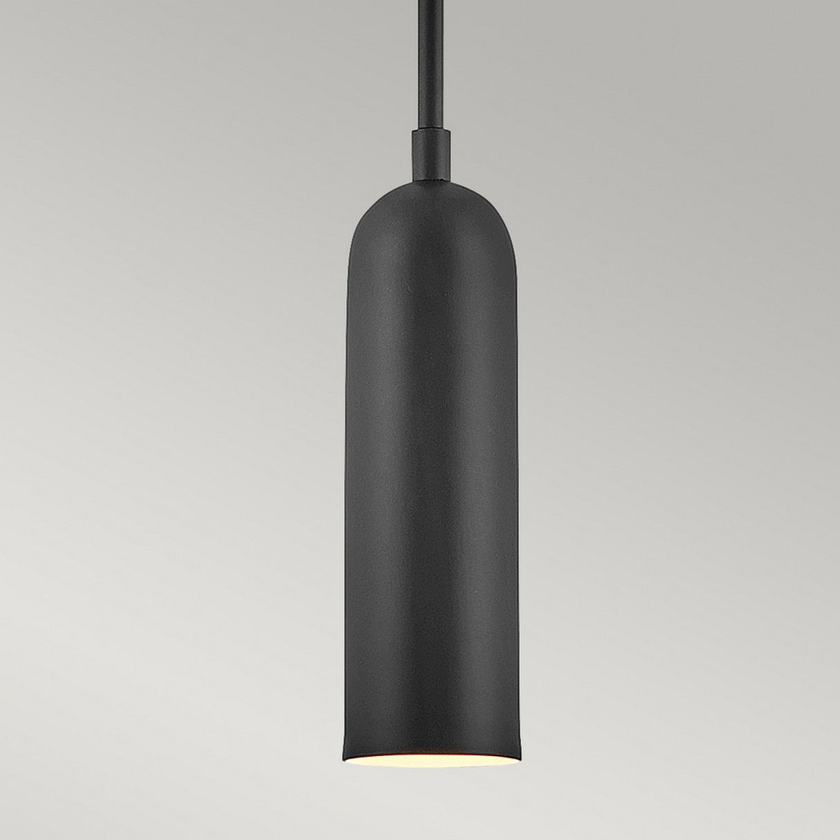 The Dax LED Mini Pendant - Black is a sleek, modern lighting fixture featuring a cylindrical black shade suspended from a black cord against a neutral background, providing energy-efficient illumination.