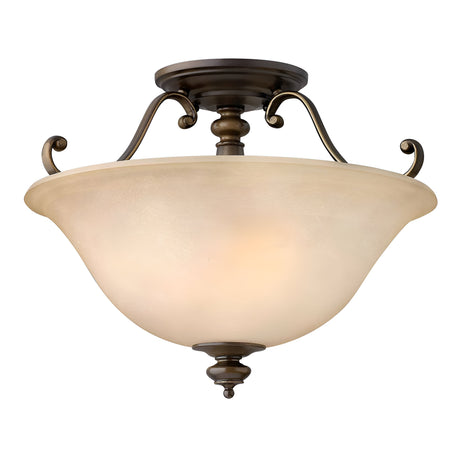 The Dunhill 2 Light Semi Flush - Bronze is a ceiling-mounted light fixture with an antique brass finish and a vintage-inspired frosted glass shade. It showcases elegant curved metal arms and intricate detailing at the base, offering a classic, vintage look.