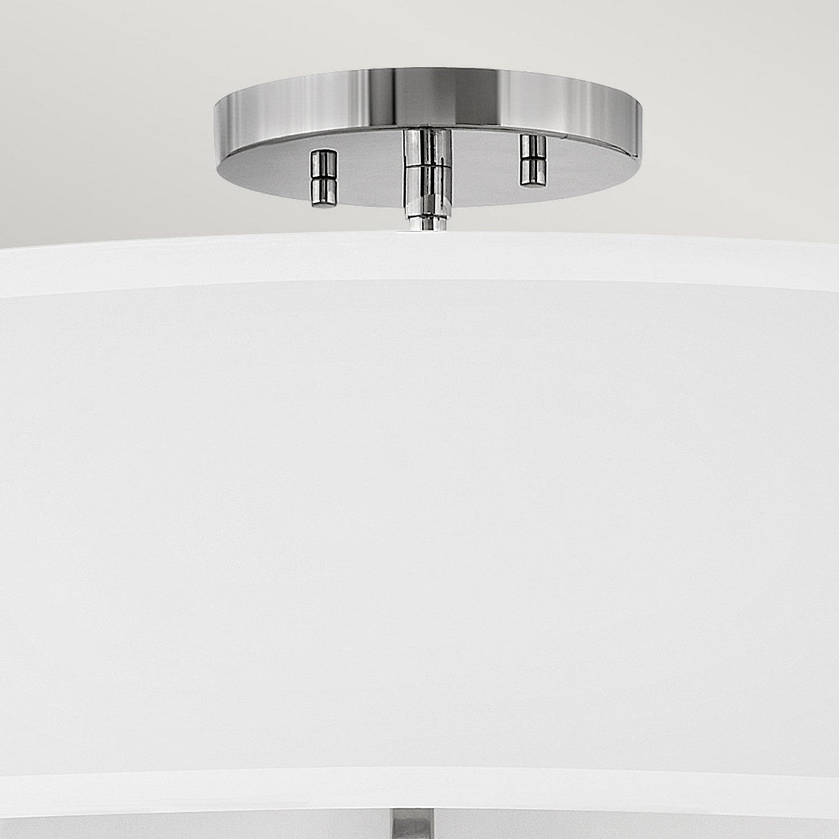 Introducing the Graham 4 Light Duo-Mount Pendant/Semi-Flush, featuring a polished nickel base and a minimalist design. This modern fixture elegantly enhances your decor with its stylish touch and versatile mounting options.