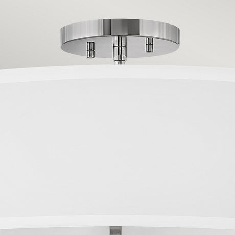 Introducing the Graham 4 Light Duo-Mount Pendant/Semi-Flush, featuring a polished nickel base and a minimalist design. This modern fixture elegantly enhances your decor with its stylish touch and versatile mounting options.
