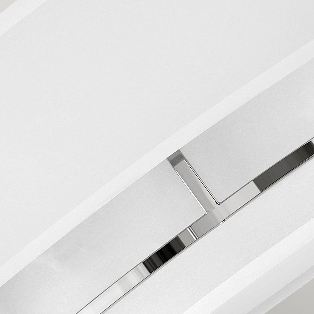 Close-up of a modern architectural detail showcasing overlapping white panels intersected by a polished nickel accent positioned diagonally through the center. Reminiscent of the Graham 4 Light Duo-Mount Pendant/Semi-Flush in Polished Nickel, its design embodies a minimalist and sleek aesthetic.