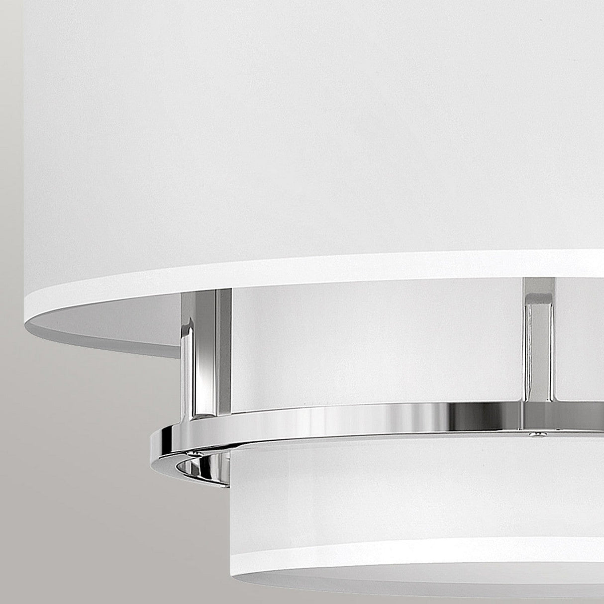 Close-up of the Graham 3 Light Duo-Mount Pendant/Semi-Flush featuring a minimalist design with a white cylindrical shade and a polished nickel accent, resembling an elegant candle cluster.