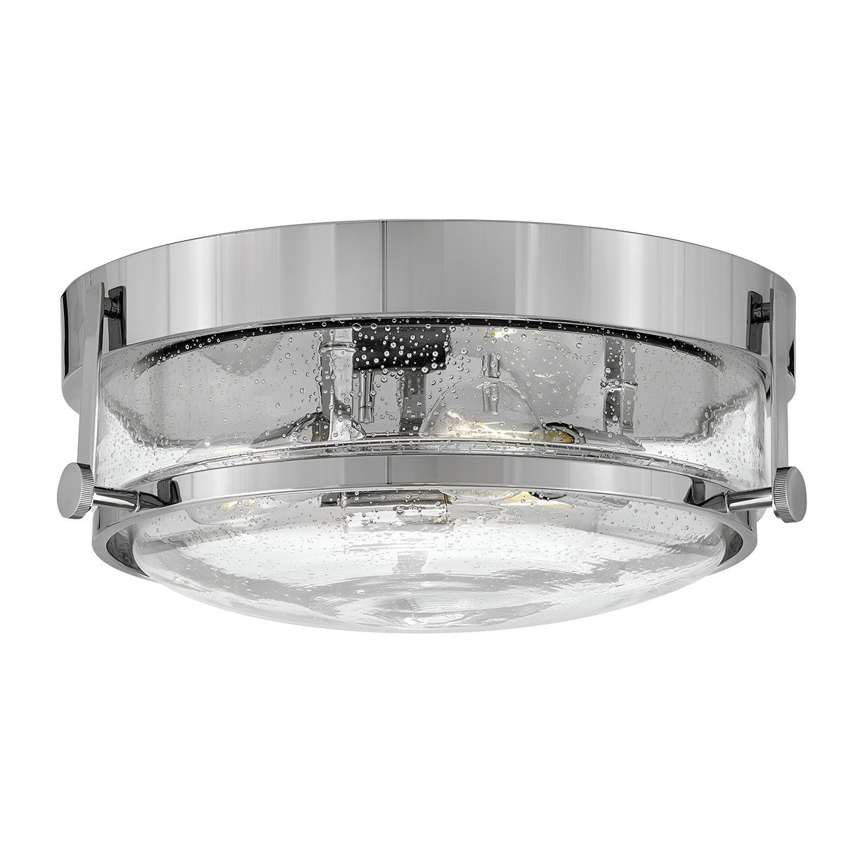 The Harper 3 Light Flush in polished chrome with clear seeded glass showcases delicate bubble-like details. Its sleek design exudes contemporary elegance, making it an ideal choice for various interior settings.