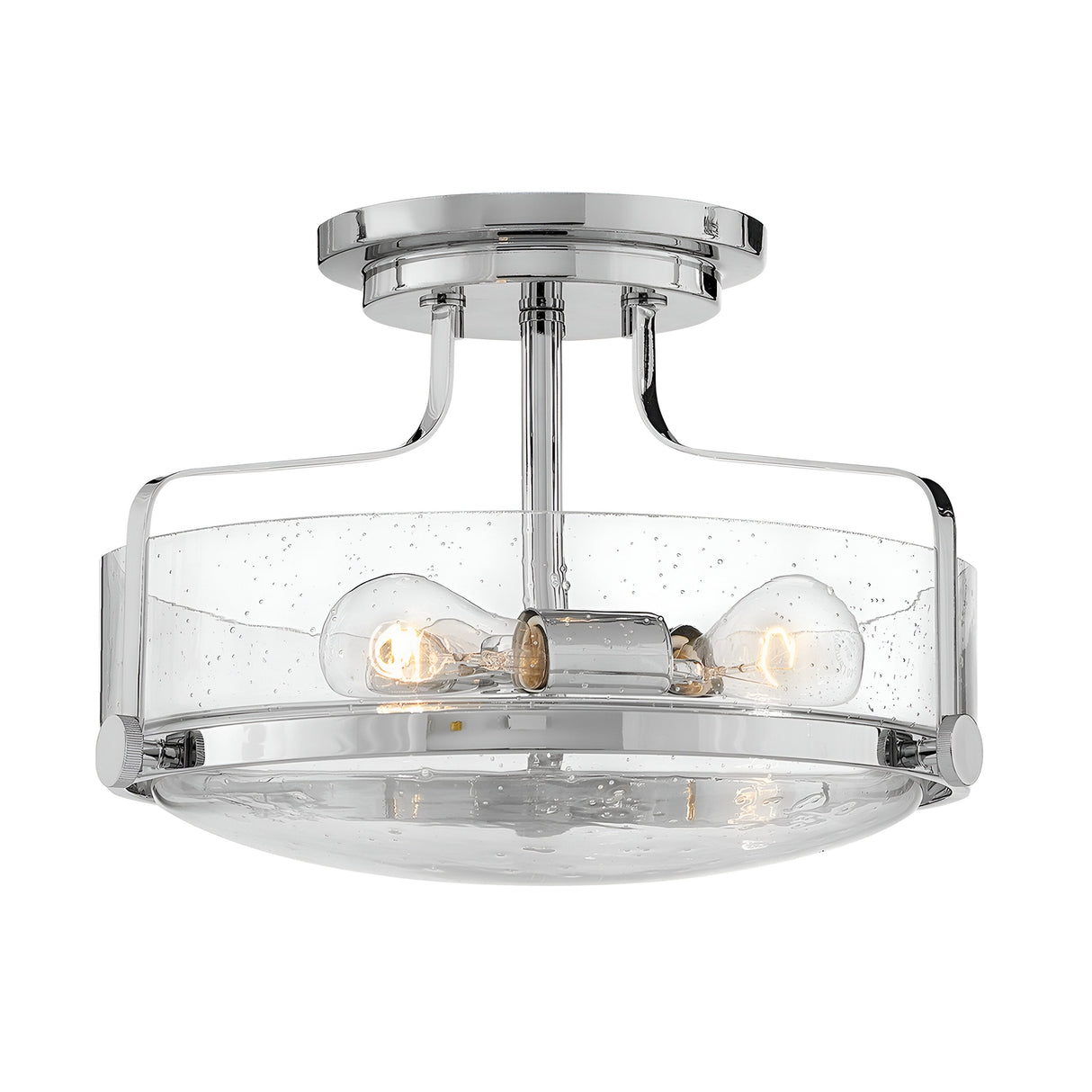 The Harper 3 Light Small Semi Flush in polished chrome showcases a sleek circular design equipped with three bulbs, all beautifully enclosed within clear seeded glass, and is elegantly supported by a simple cylindrical base.