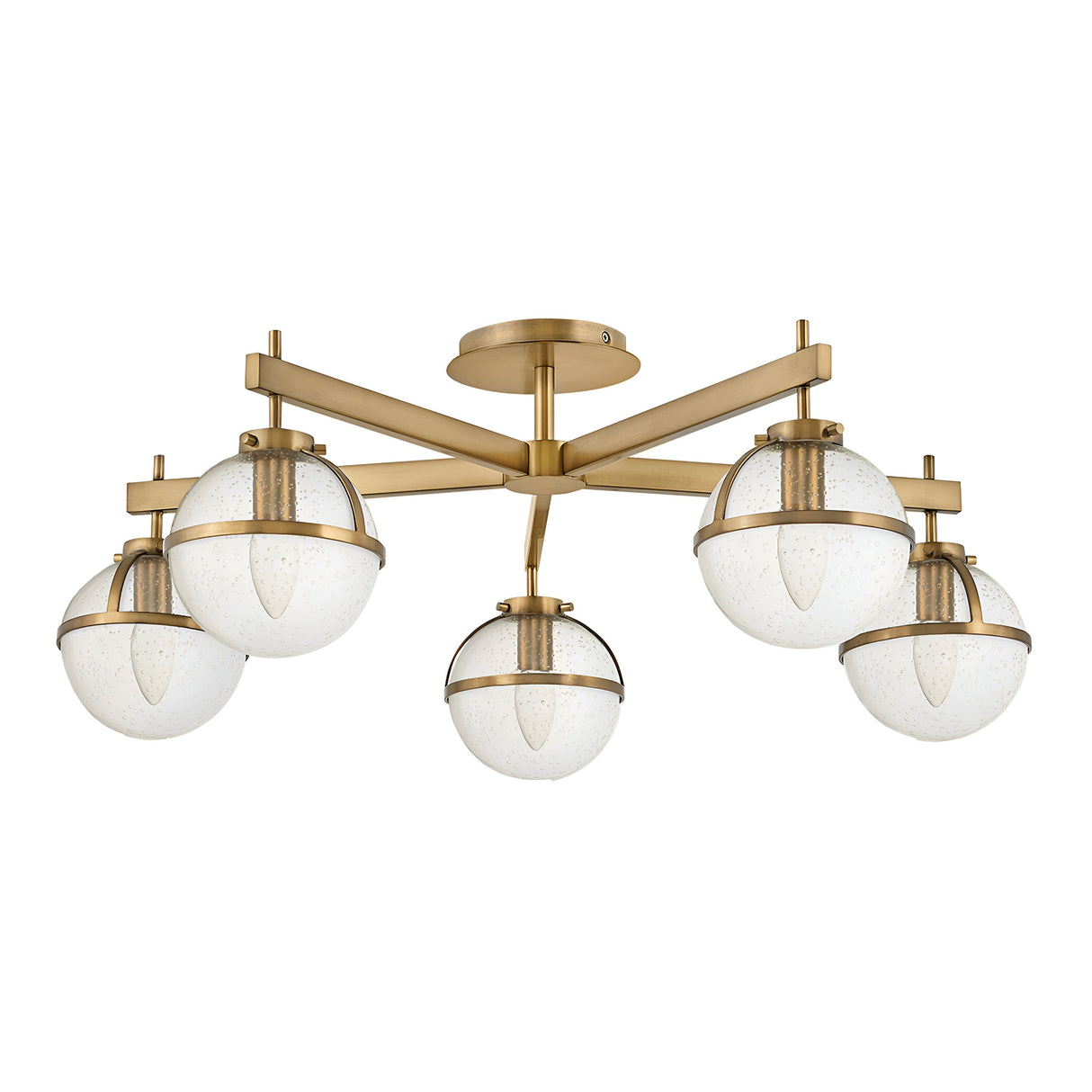 The Hollis 5 Light Semi Flush in heritage brass showcases a sleek geometric design, with horizontal metal arms extending from a central base. Each arm is adorned with clear seeded glass globe light fixtures, adding modern elegance to any space.