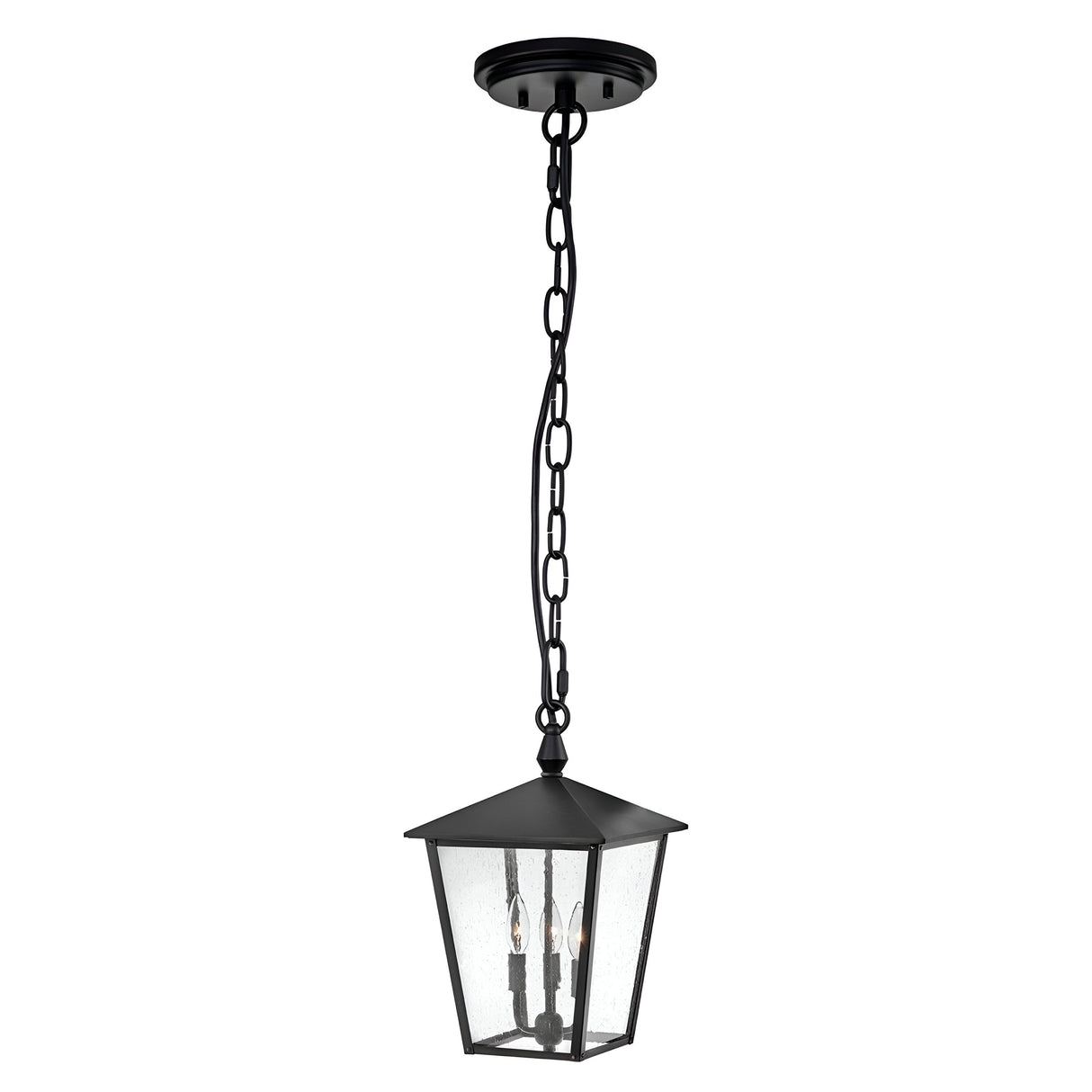 The Huntersfield Outdoor 3 Light Large Chain Pendant in black showcases a classic lantern design with a pointed top and clear glass panels, featuring three candle-shaped bulbs enclosed within.