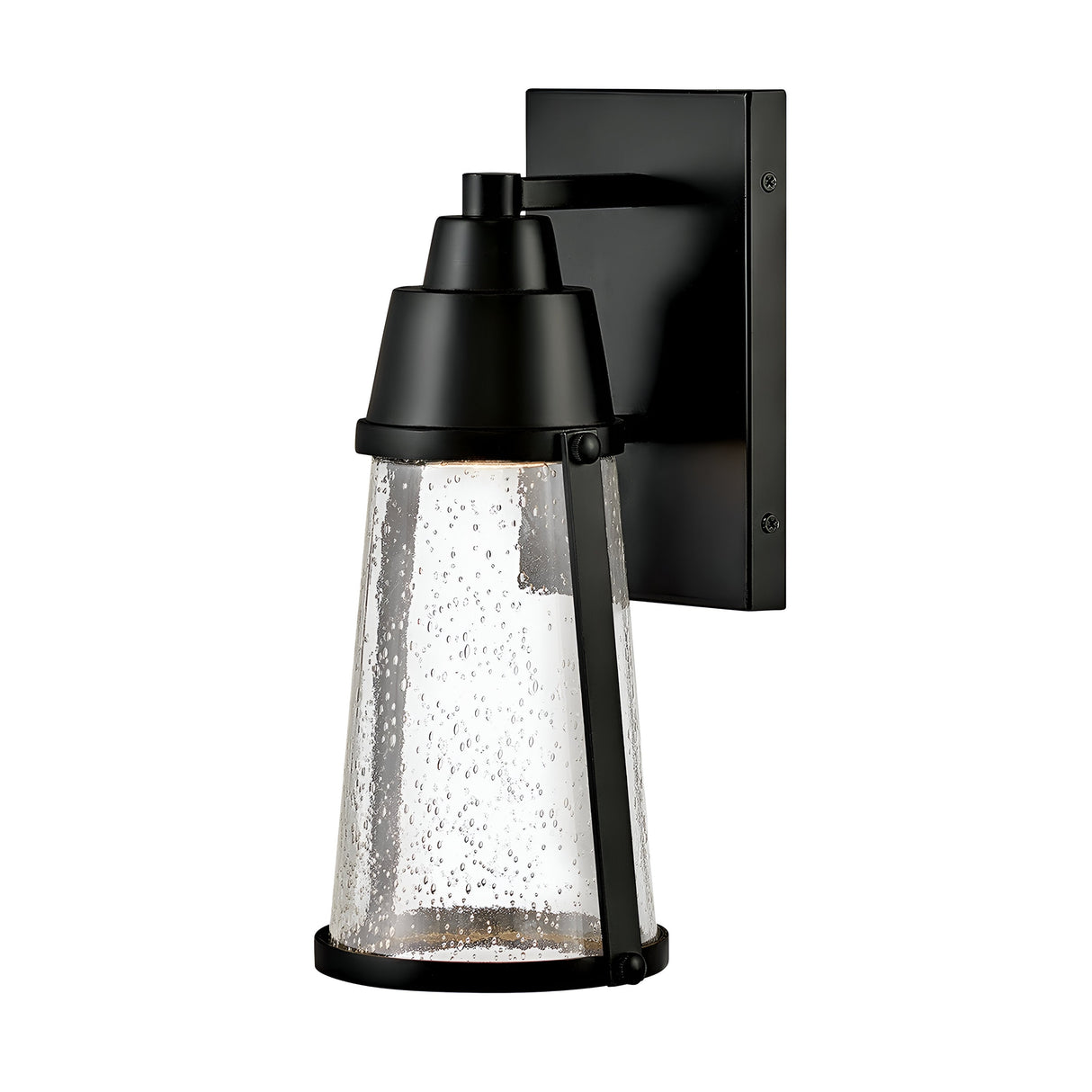 Introducing the Miles 1 Light Wall Lantern in black, a modern outdoor wall sconce with a nautical theme. It features a tapered, cylindrical, clear seedy glass shade and showcases an energy-efficient lighting system. The fixture is complete with a rectangular backplate and conical top for a sleek and contemporary appearance.