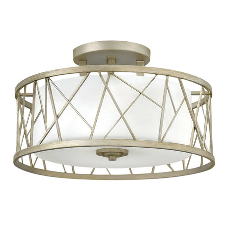 Introducing the Nest 3 Light Semi Flush, a modern ceiling light fixture boasting a round drum shape. This elegant design features a geometric metal frame and linen glass diffuser, embodying organic modern elements with its sophisticated gold finish for an elegant and contemporary look.