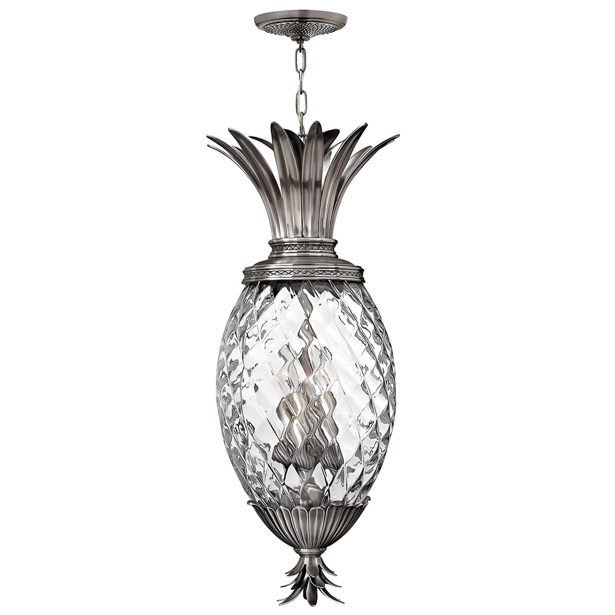 The Plantation 4 Light Pendant - Polished Antique Nickel elegantly hangs from a chain, featuring a pineapple-shaped design with a silver metallic frame and clear optic glass body. Its decorative leaf-like elements and polished antique nickel finish add to its sophisticated appearance.
