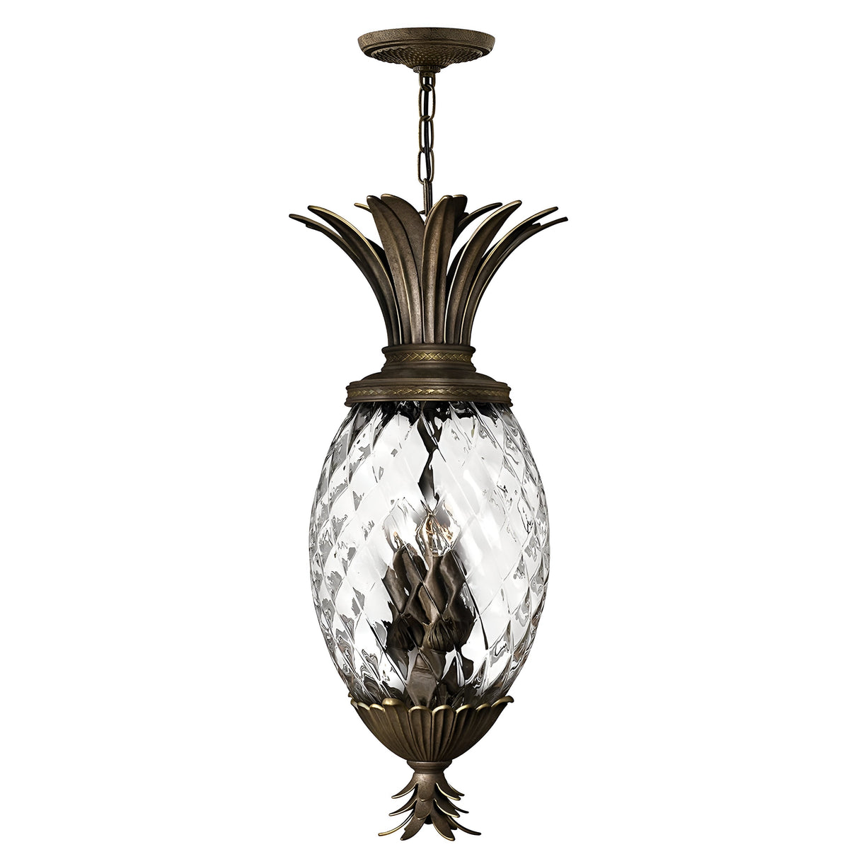 The Plantation 4 Light Pendant - Bronze is a light fixture shaped like a pineapple, featuring pineapple-shaped optic glass with metal leaf accents in a rich bronze finish at both the top and bottom, emitting warm light.