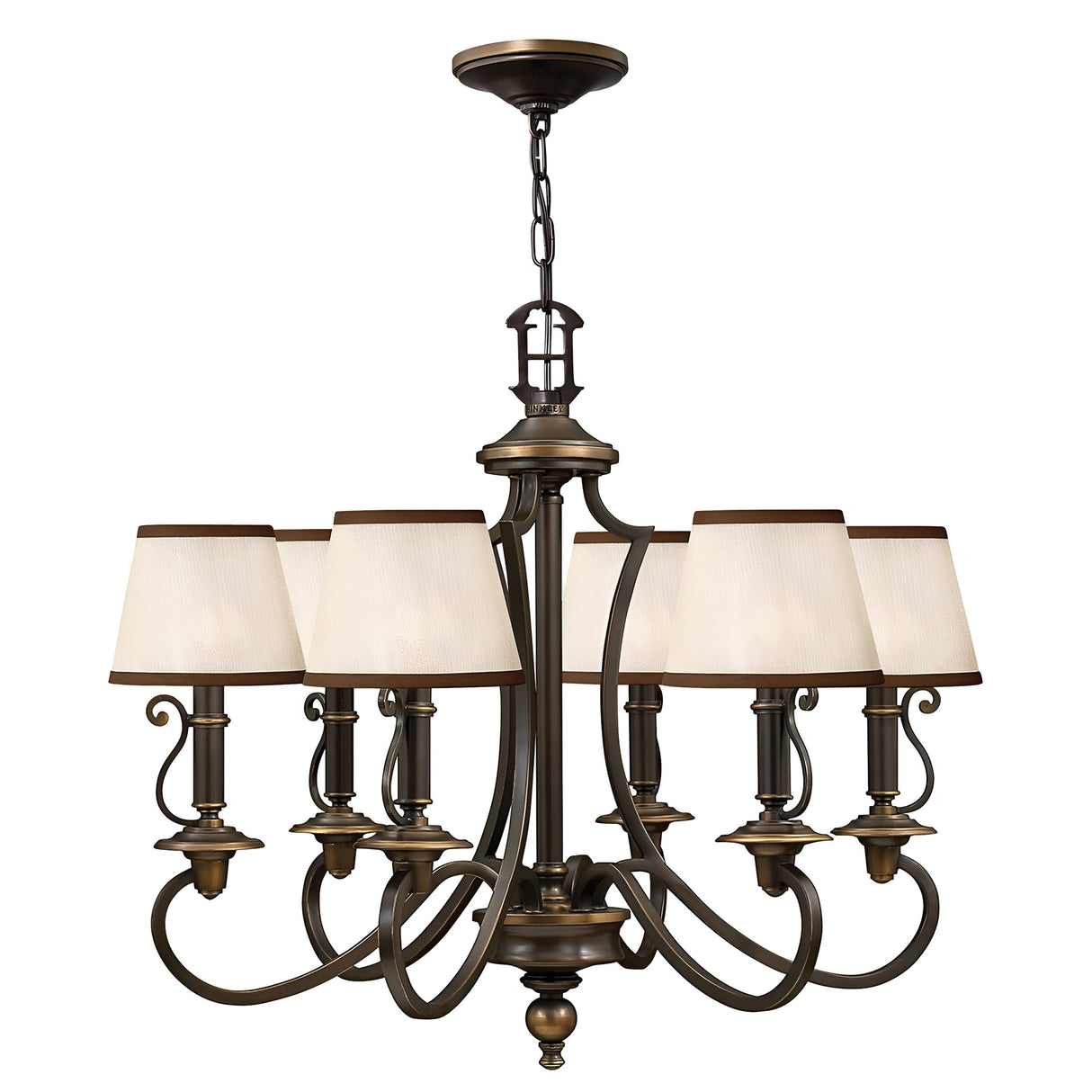 Introducing an elegant chandelier with vintage charm: this bronze fixture features eight arms adorned with white fabric lampshades, arranged in a circular pattern. It hangs gracefully from a chain, showcasing ornate curved detailing and a central column, reminiscent of the Plymouth 6 Light Chandelier - Bronze.
