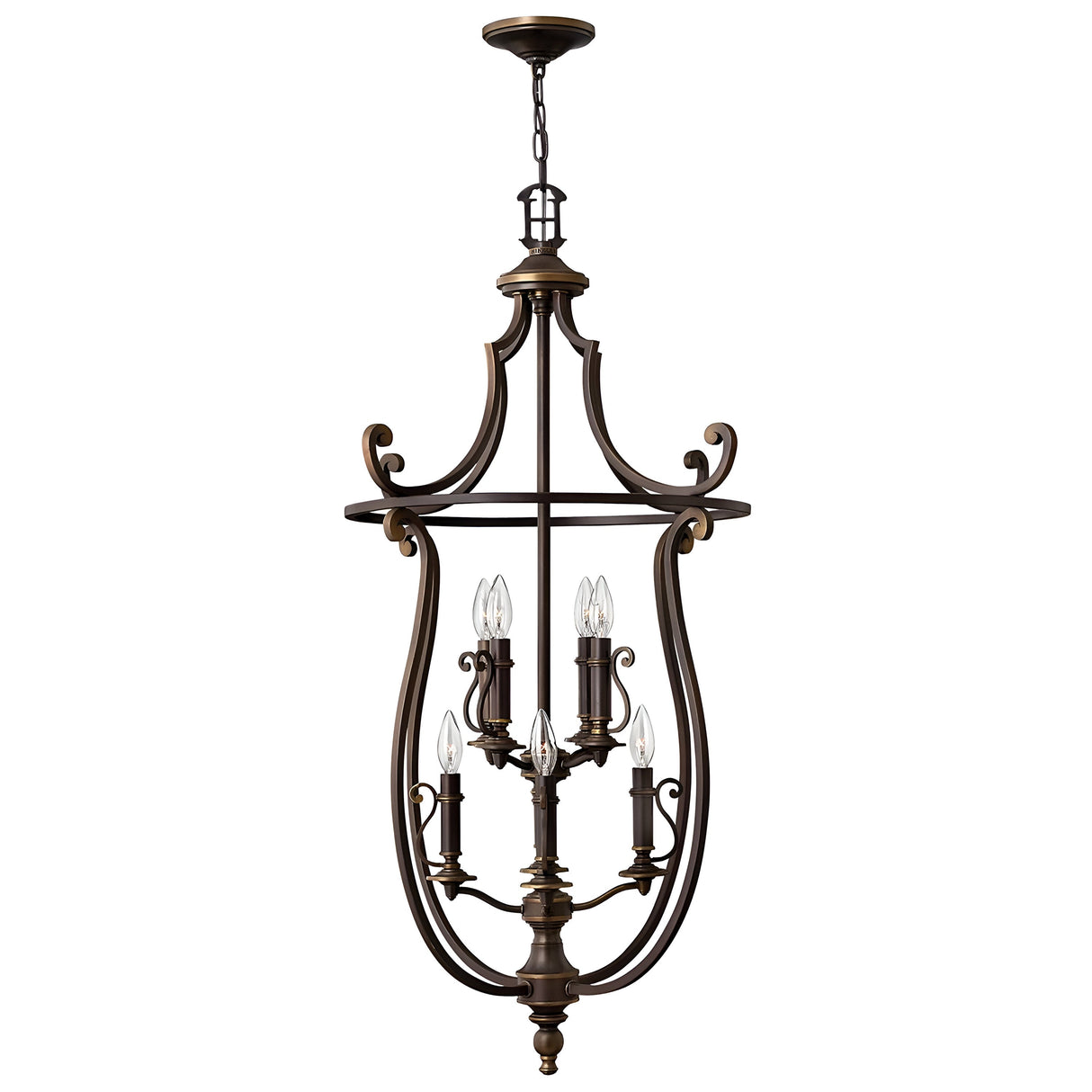 The Plymouth 8 Light Chandelier - Bronze boasts an elegant open-frame design with eight candle-style lights adorned with vintage candle sleeves. Suspended from a chain, it features intricate scrollwork, offering a classic and sophisticated appearance.