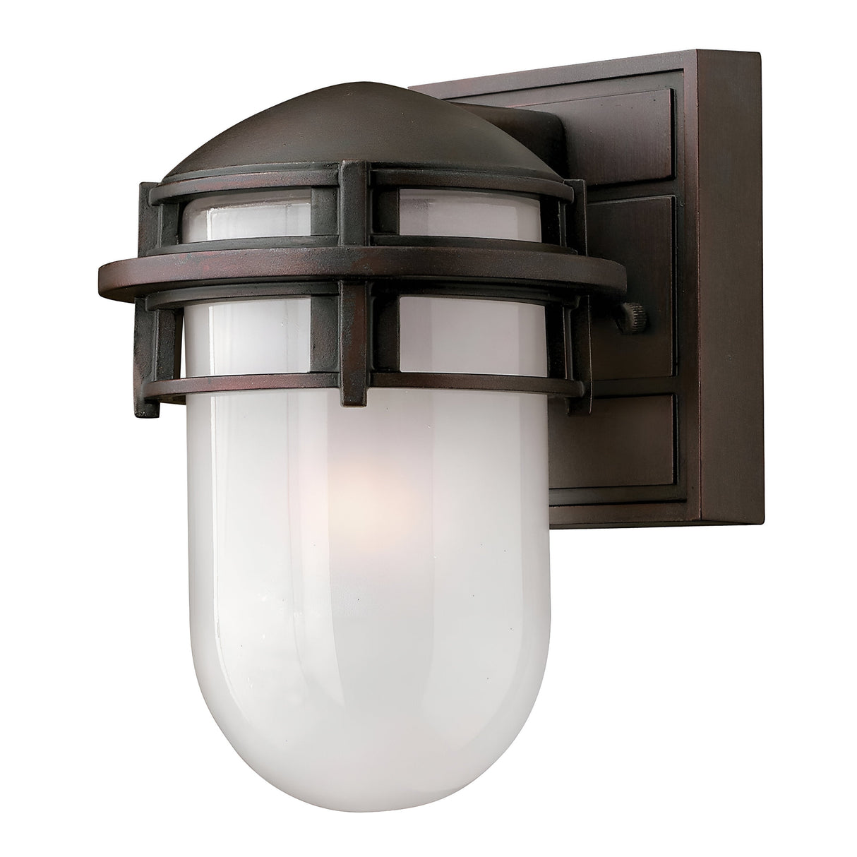 The Reef Mini Outdoor 1 Light Lantern - Bronze is a wall-mounted lantern-style light fixture that includes a frosted glass shade and a bronze-finished cast aluminum frame. It features a rounded top and grid-like pattern, giving it a classic, industrial appearance, and is IP44 rated for weather resistance.