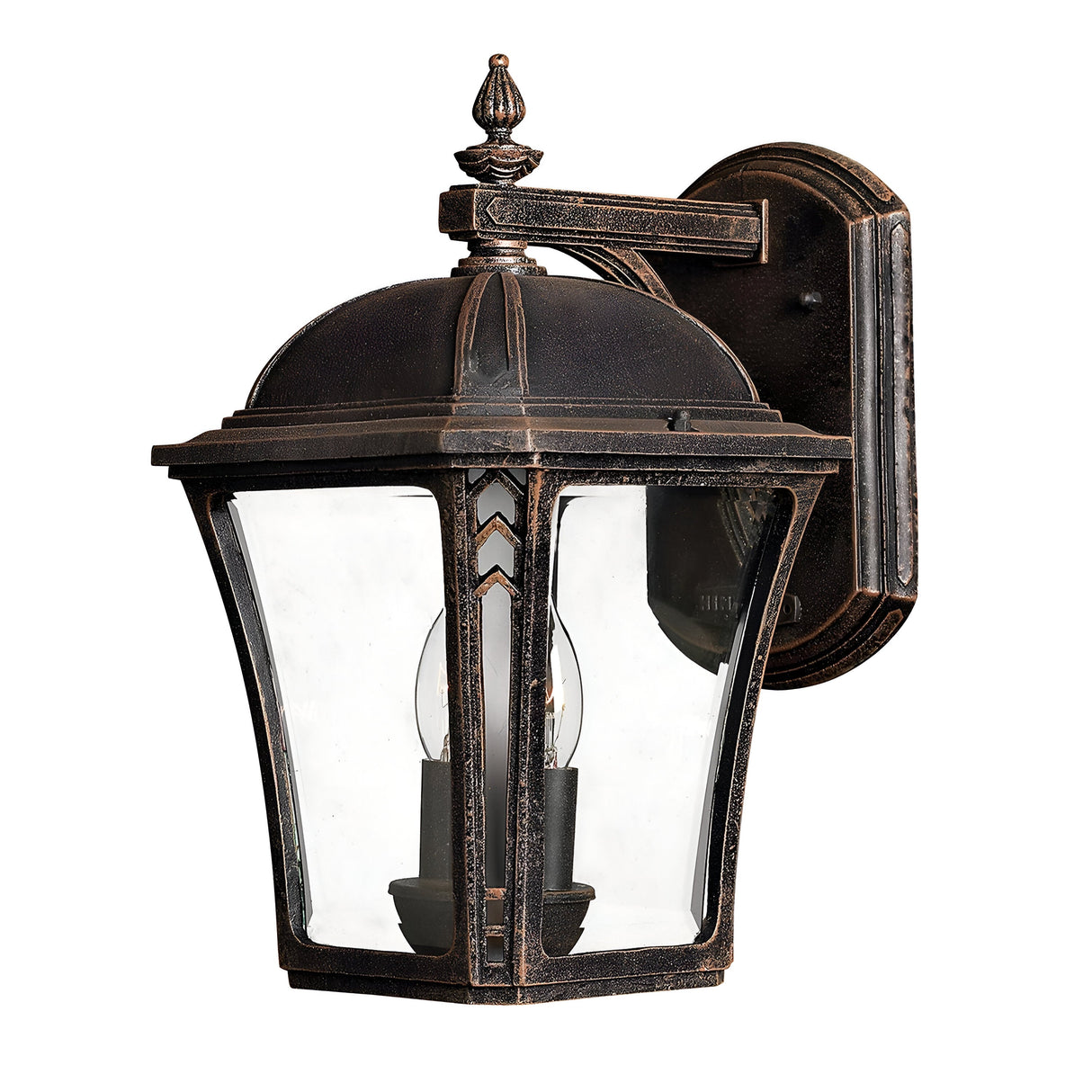 The Wabash Outdoor 2 Light Medium Wall Lantern - Bronze is a rustic wall lantern with a glass panel design. It features an ornate top finial and a curved arm, accommodating two bulbs. With its vintage aesthetic and subtle chevron design, it is ideal for enhancing your exterior décor.