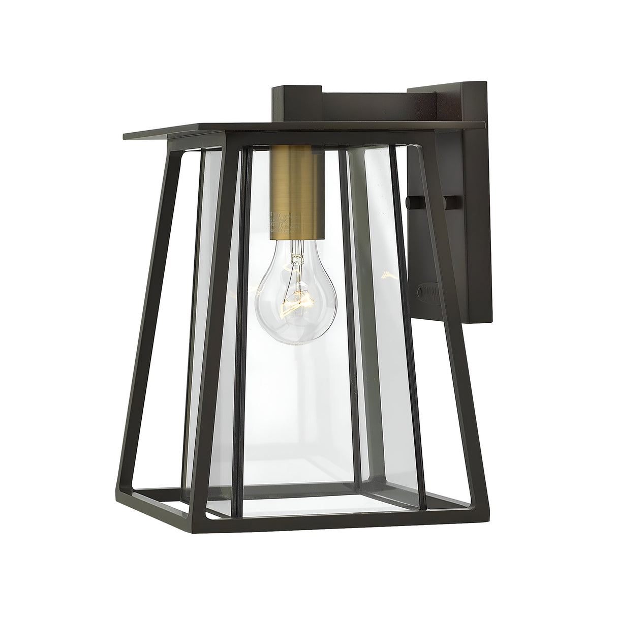 Introducing the Walker Outdoor 1 Light Medium Wall Lantern in Bronze with Heritage Brass. This outdoor wall lantern combines a minimalist, geometric design with a black metal frame and clear glass panels, making it an ideal addition to rustic decor. It features a single exposed light bulb and is mounted on a flat rectangular backplate, providing elegant outdoor lighting.