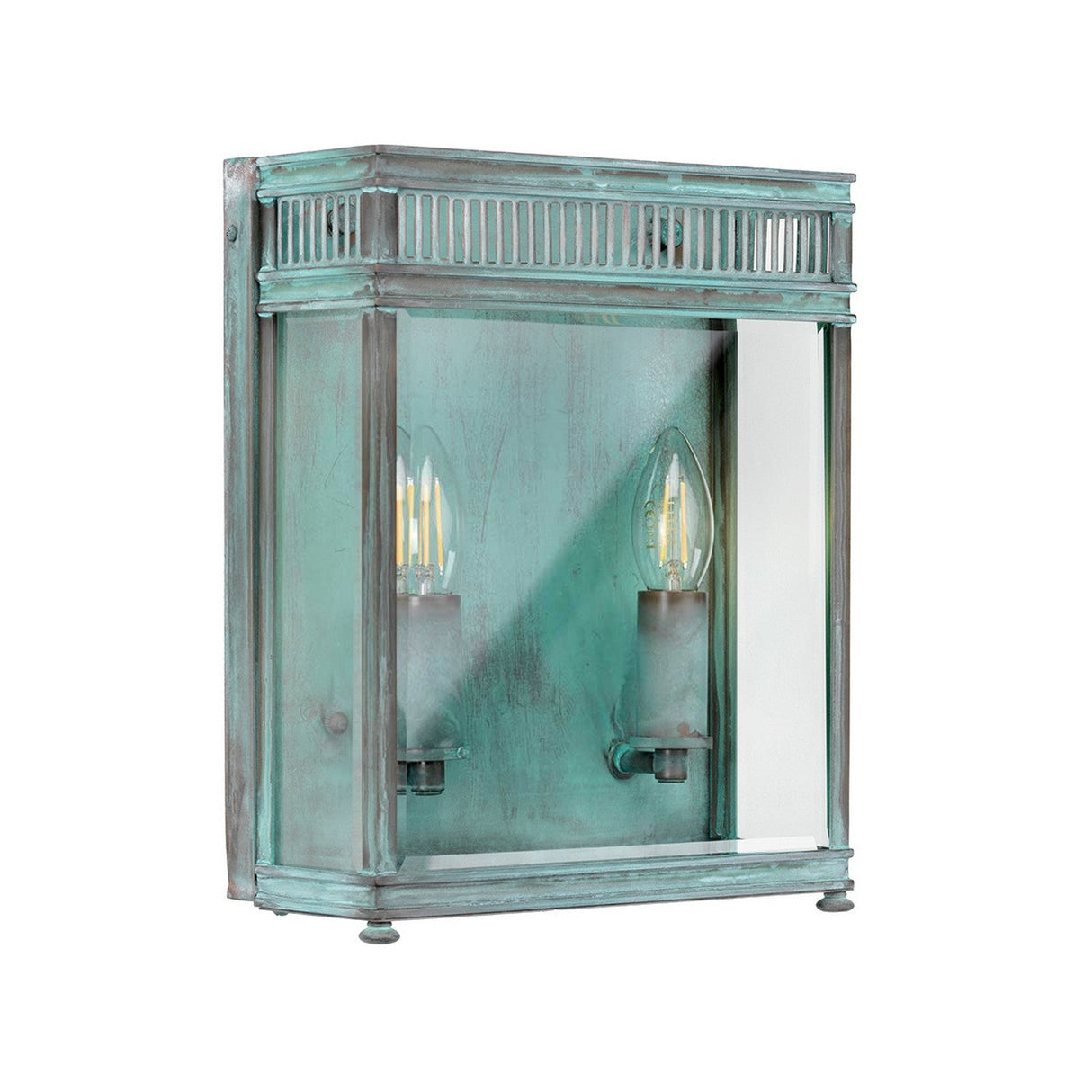 The Holborn 1 Light Outdoor Small Wall Lantern - Verdigris features a vintage-inspired design with a distressed teal finish that exudes a verdigris aesthetic. It includes one candle-like bulb enclosed in a rectangular glass box, topped with decorative slats, making it perfect for adding character to both indoor atmospheres and outdoor lighting settings.