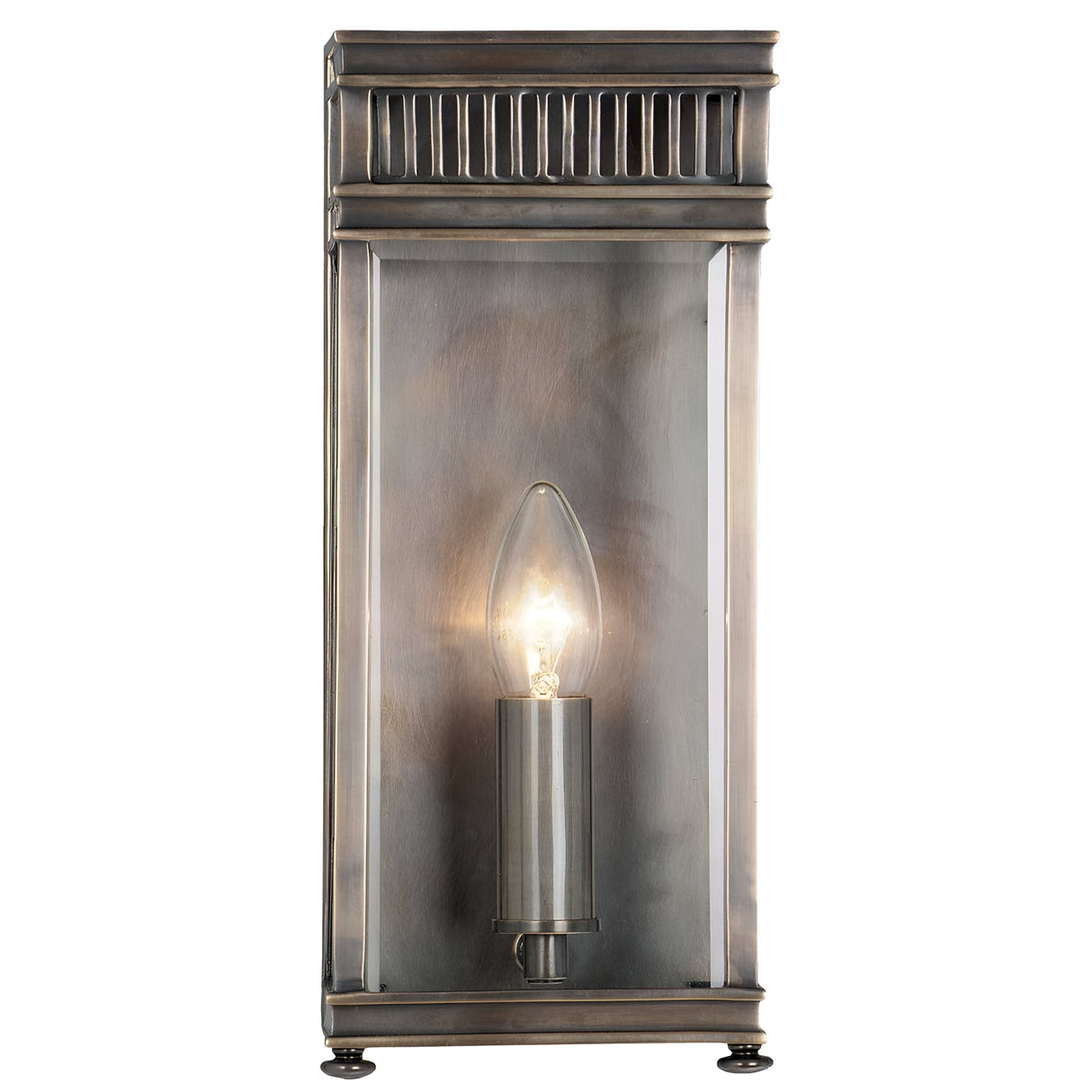 Introducing the Holborn 1 Light Outdoor Small Wall Lantern in Dark Bronze: This vintage-inspired wall sconce showcases an exposed bulb and features a classic rectangular frame that echoes Georgian design elements. Its antique bronze-like finish is accentuated by decorative ridges at the top, while the bulb is elegantly positioned on a central cylindrical base.