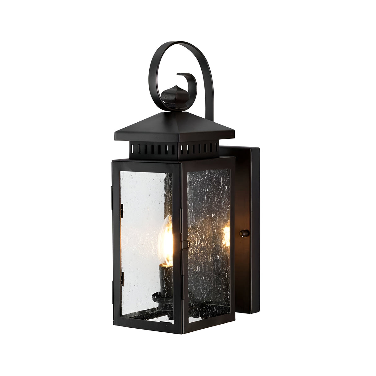 Introducing the Hythe 1 Light Outdoor Wall Light in Old Bronze, featuring a classic rectangular design. This vintage lantern-style light showcases clear glass panels encasing a single candle-style bulb. It is elegantly mounted on a simple rectangular backplate and decorated with a charming loop at the top.