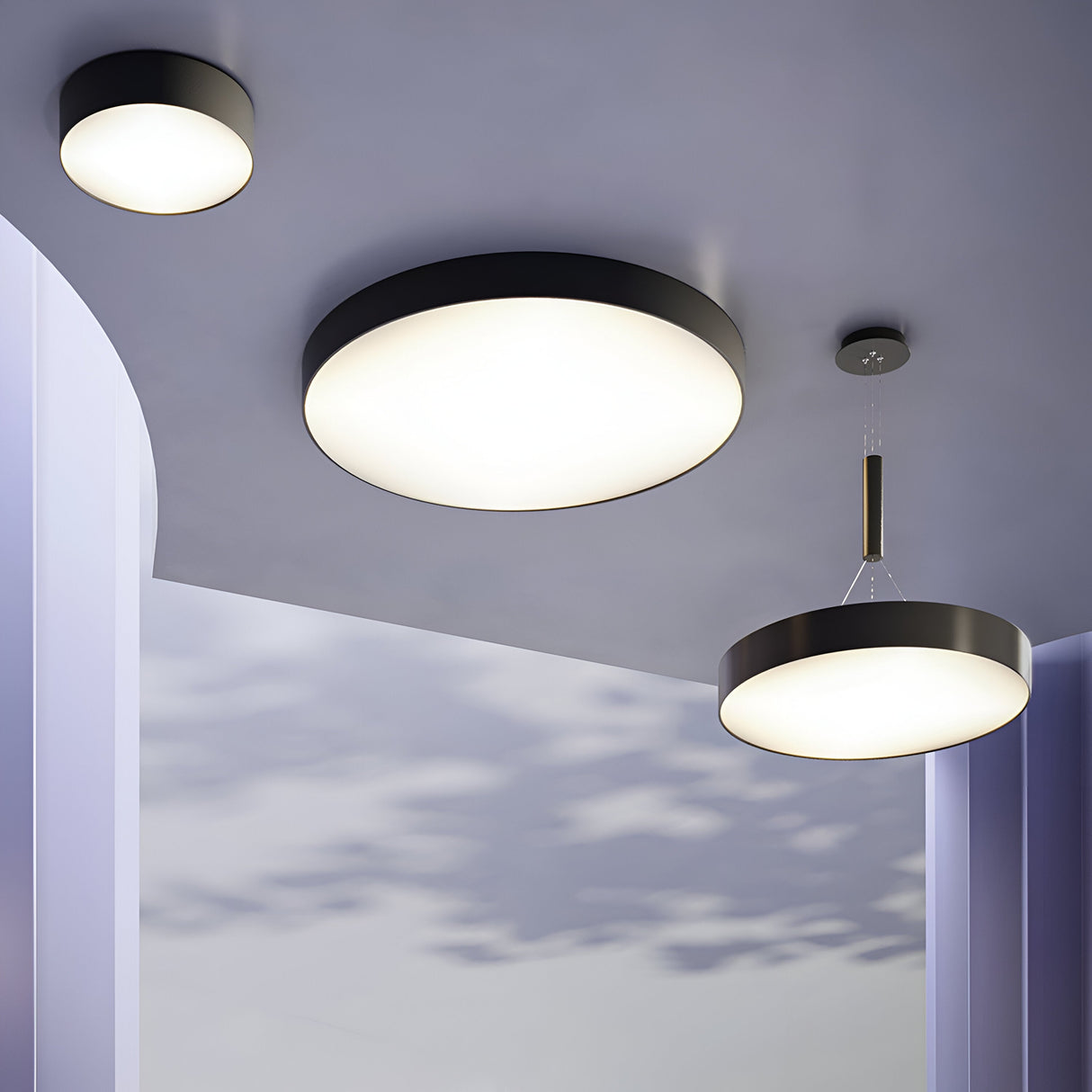Zon medium flush ceiling light in black, designed to enhance contemporary interiors with its seamless look.