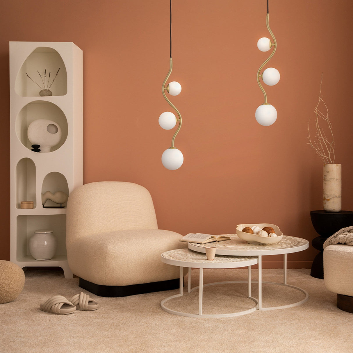 Interior view of Uva 3 light pendant in gold with frosted glass, highlighting its luxurious design.