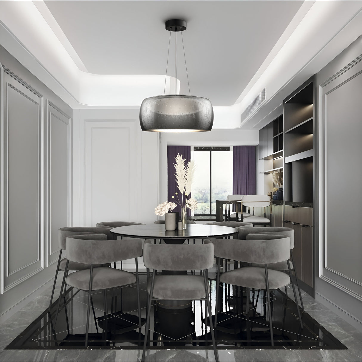 Elegant dining room with a round glass table, eight gray chairs, and the Solen LED Pendant featuring a black glass dome with raindrop effect. The walls have decorative molding enhanced by purple curtains. Minimalist shelving on the right adds an industrial touch.