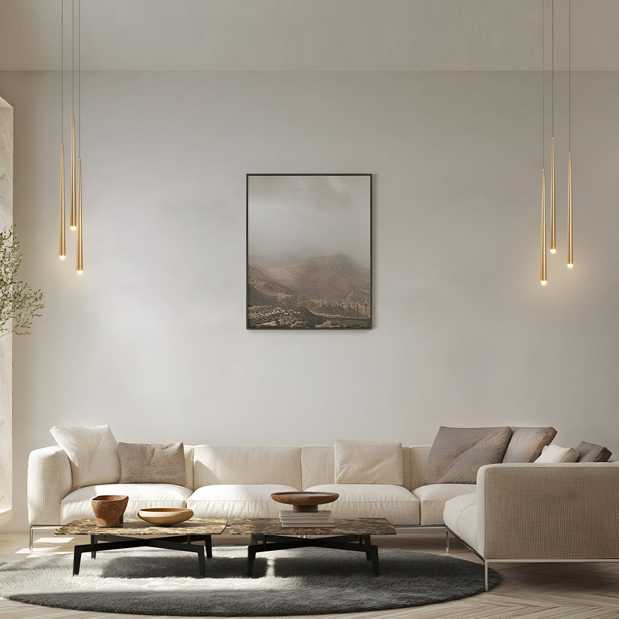 In a modern living room, a beige sectional sofa with gray and brown cushions rests on a round rug beside a wooden coffee table. Four Cascade CCT Dimmable LED Cluster Pendant Lights, adjustable between 3000-4000K in black, hang above to enhance the ambiance. A landscape painting adorns the wall.