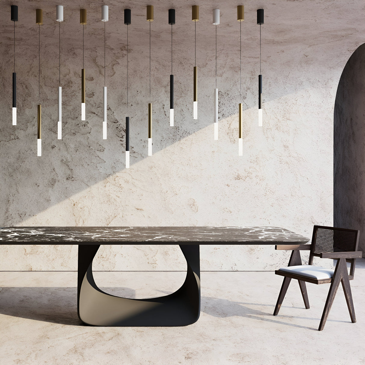 A modern interior with a minimalist design features a sleek table with a curved base and marble top, paired with a stylish chair having a cushioned seat. Above, Pro Shade LED Thin Pendant Lights in white hang from the ceiling, casting shadows on textured, warm-toned walls.
