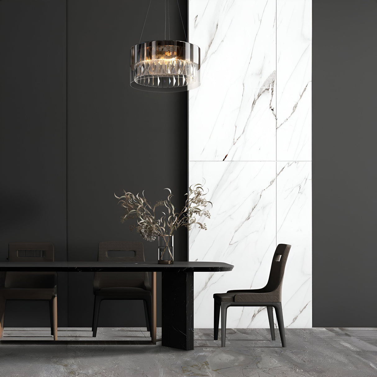 In a modern dining room, a black table is paired with three dark chairs and a decorative vase filled with dried branches. The walls display a black and white marble pattern, while the Wonderland 4 Light Chandelier in gold, adorned with crystal pendants, hangs elegantly above, casting a refined glow.
