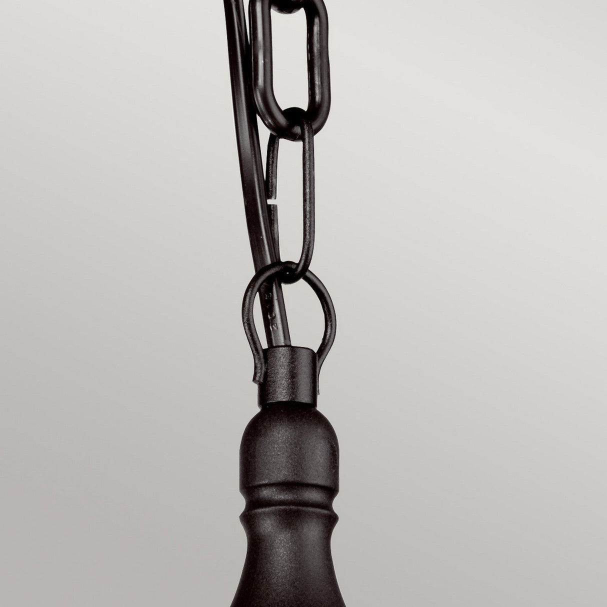 Close-up of the Kinsale 1 Light Outdoor Chain Pendant in matte black, featuring an adjustable chain linked to a robust hook. The black metal chain links and hook present a sturdy, industrial appearance against the light gray background.