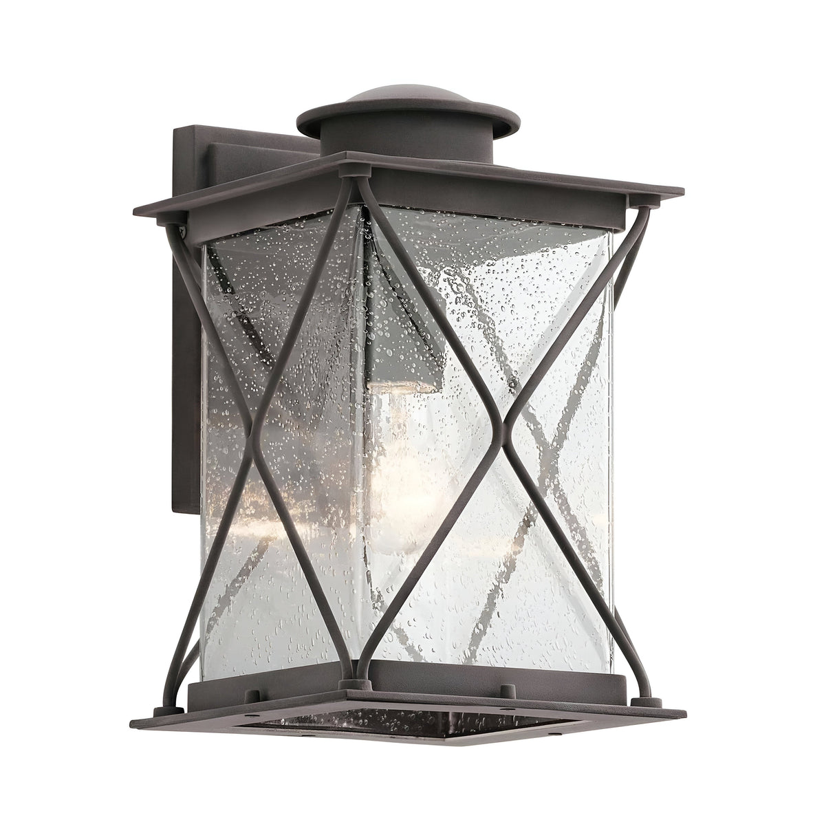 The Argyle Outdoor 1 Light Medium Wall Light in Weathered Zinc showcases a clear seeded glass complemented by a dark metal frame with an X-shaped design. Its classic lantern shape is mounted on a rectangular base, allowing the bulb to be visible through the glass.