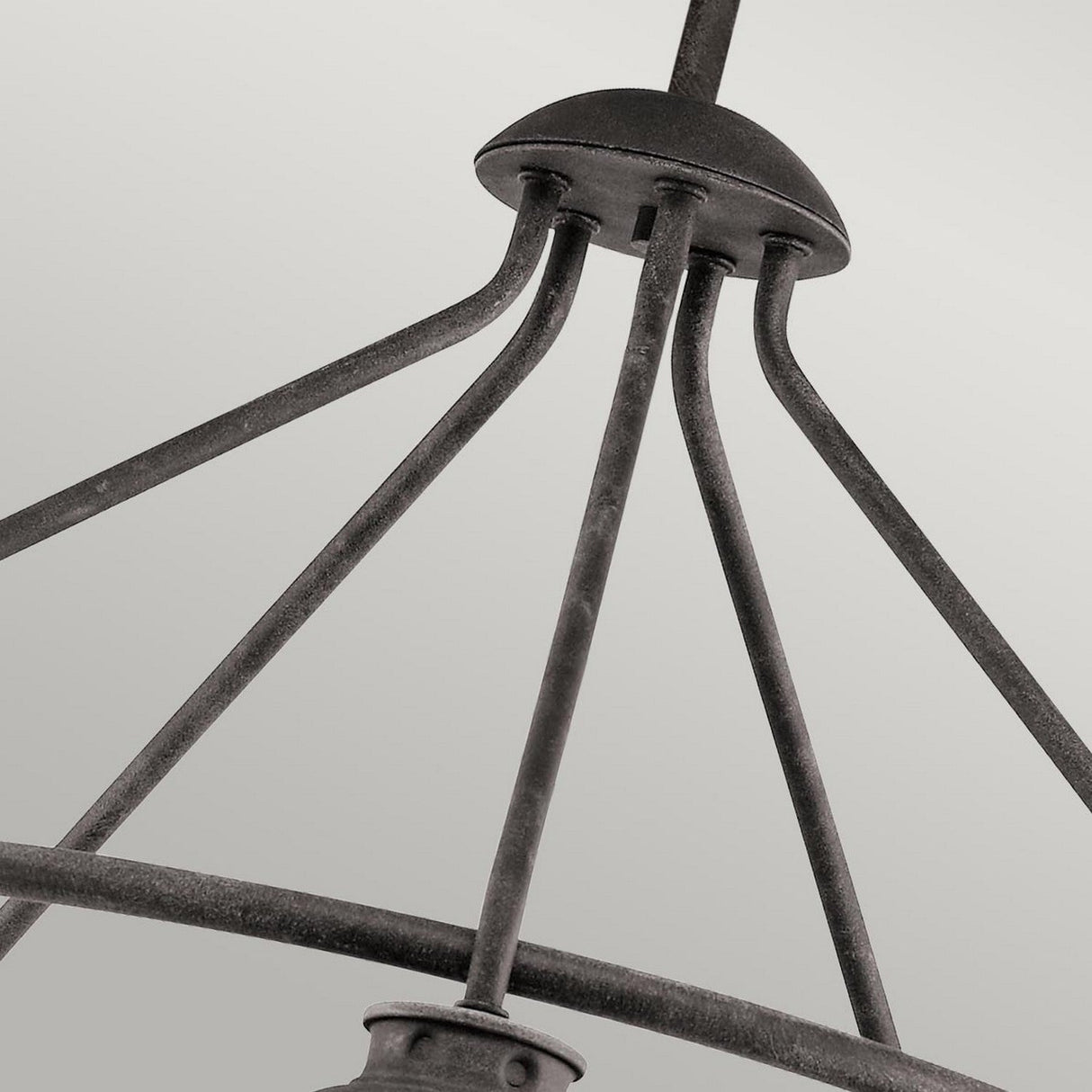 Close-up of the Ashland Bay Outdoor 5 Light Chandelier in Weathered Zinc, showcasing its rustic, vintage ambiance with five elegantly curved arms extending upward from a round base, set against a plain gray background.