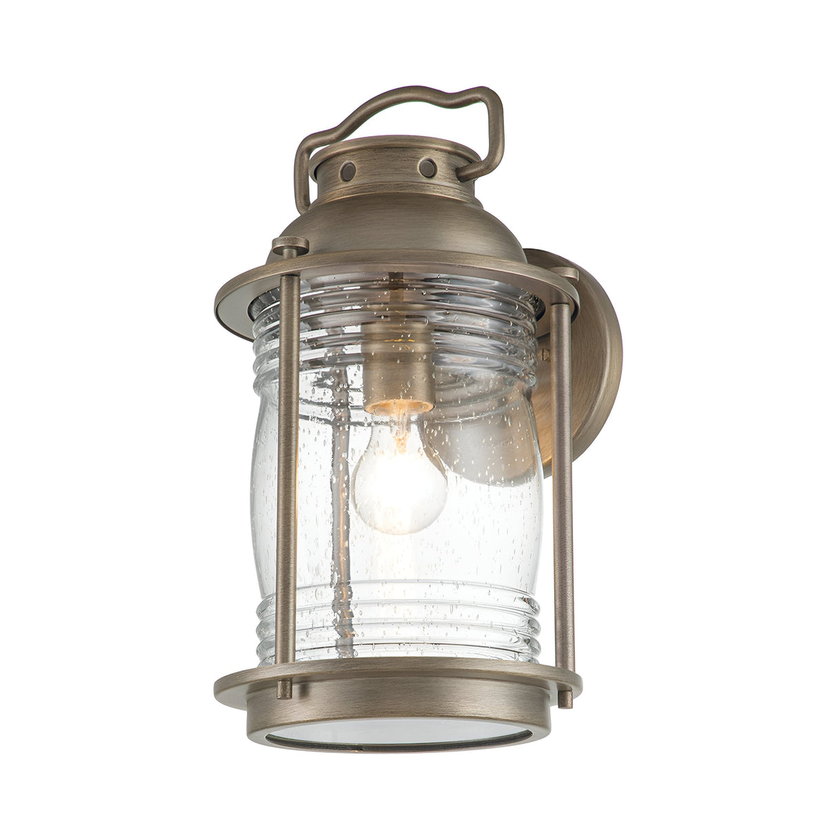 The Ashland Bay Outdoor 1 Light Large Wall Lantern in Burnished Bronze exudes vintage charm with its classic rustic appeal, featuring a clear, ribbed glass casing that encloses an LED Edison-style bulb.