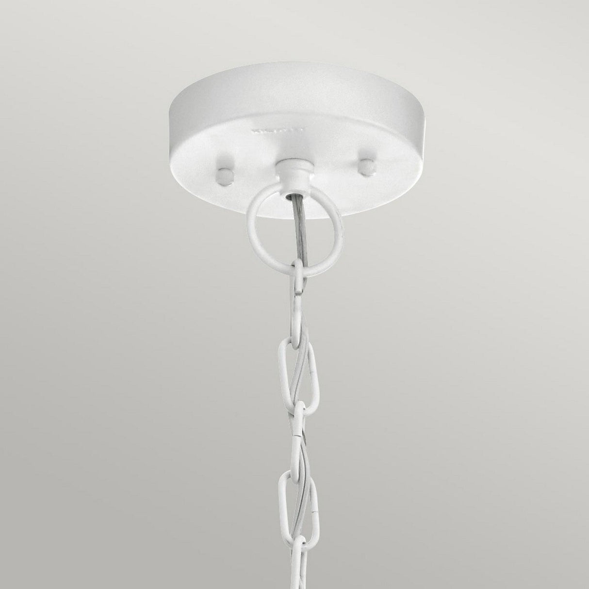 The Beacon Square Outdoor 1 Light Chain Lantern in white features a ceiling-mounted canopy and metal chain, creating a vertical design that evokes the charm of coastal exterior lighting. The chain is securely attached to the canopy with a hook, allowing its sleek and modern aesthetic to stand out beautifully against the plain light gray background.