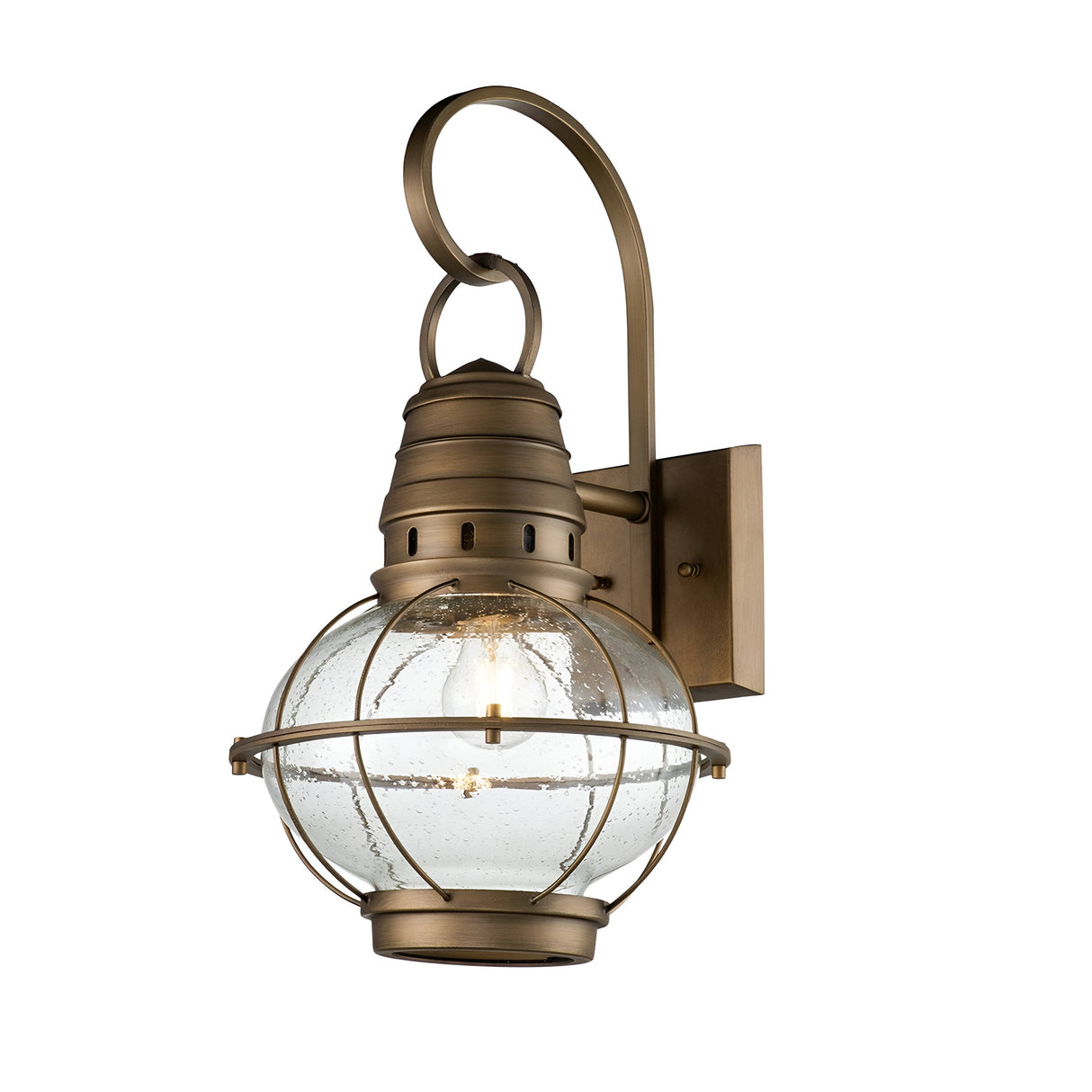 The Bridgepoint Outdoor 1 Light Large Wall Lantern in natural brass showcases a curved arm and clear seeded glass globe. Featuring a caged bulb design and mounted on a rectangular backplate, this fixture is perfect for exterior lighting and adds a vintage touch to your outdoor decor.