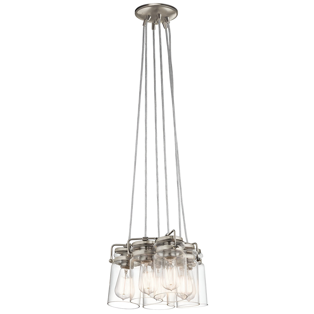 The Brinley 6 Light Pendant - Brushed Nickel features multiple clear glass shades suspended from sleek metal rods, exposing the bulbs inside. Its design merges contemporary style with a touch of vintage charm.