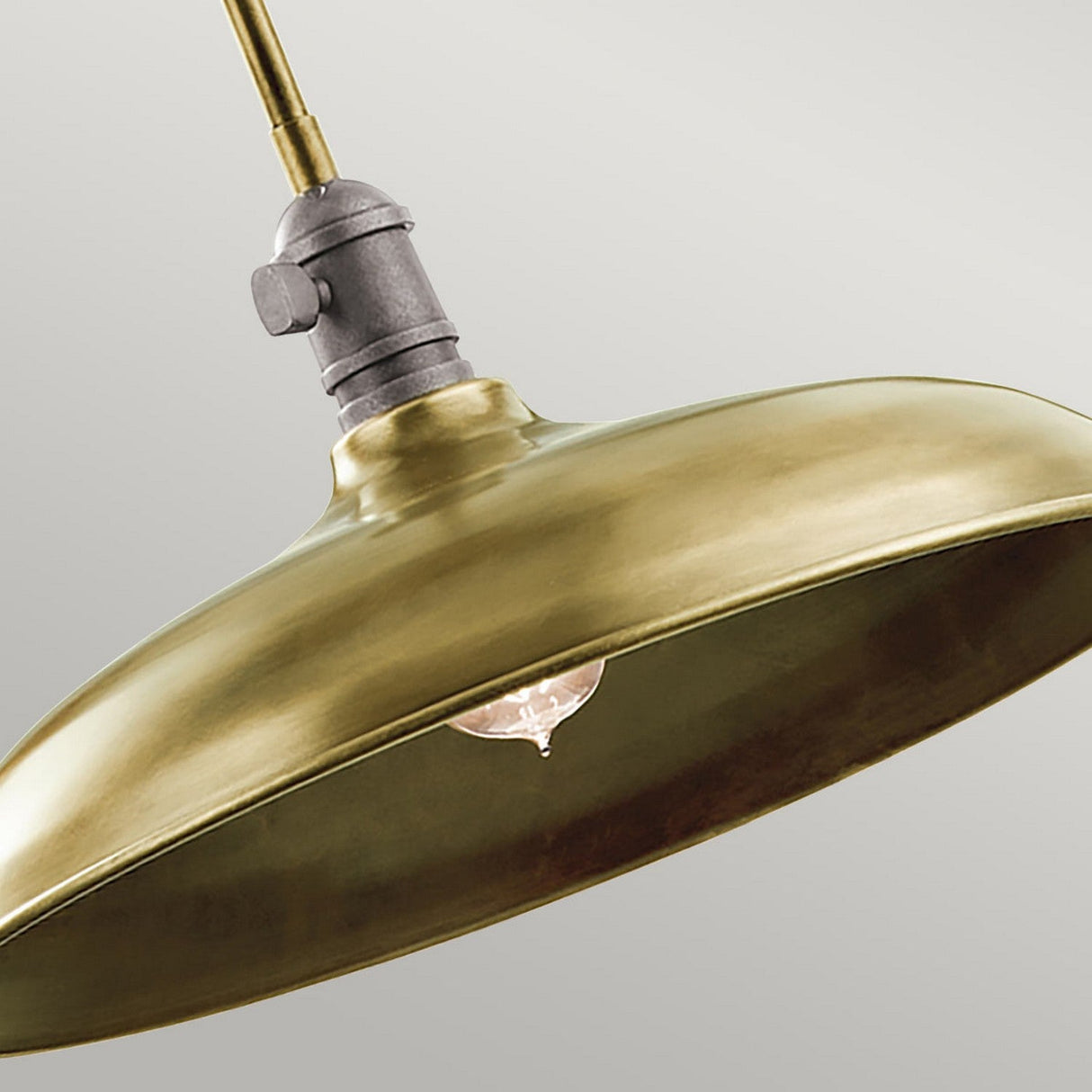 A close-up of the Cobson 1 Light Duo-Mount Pendant/Semi-Flush in a natural brass finish hanging from the ceiling. The fixture features a wide, shallow dome shape, with the bulb partially visible underneath against a plain background, capturing a vintage-inspired aesthetic.