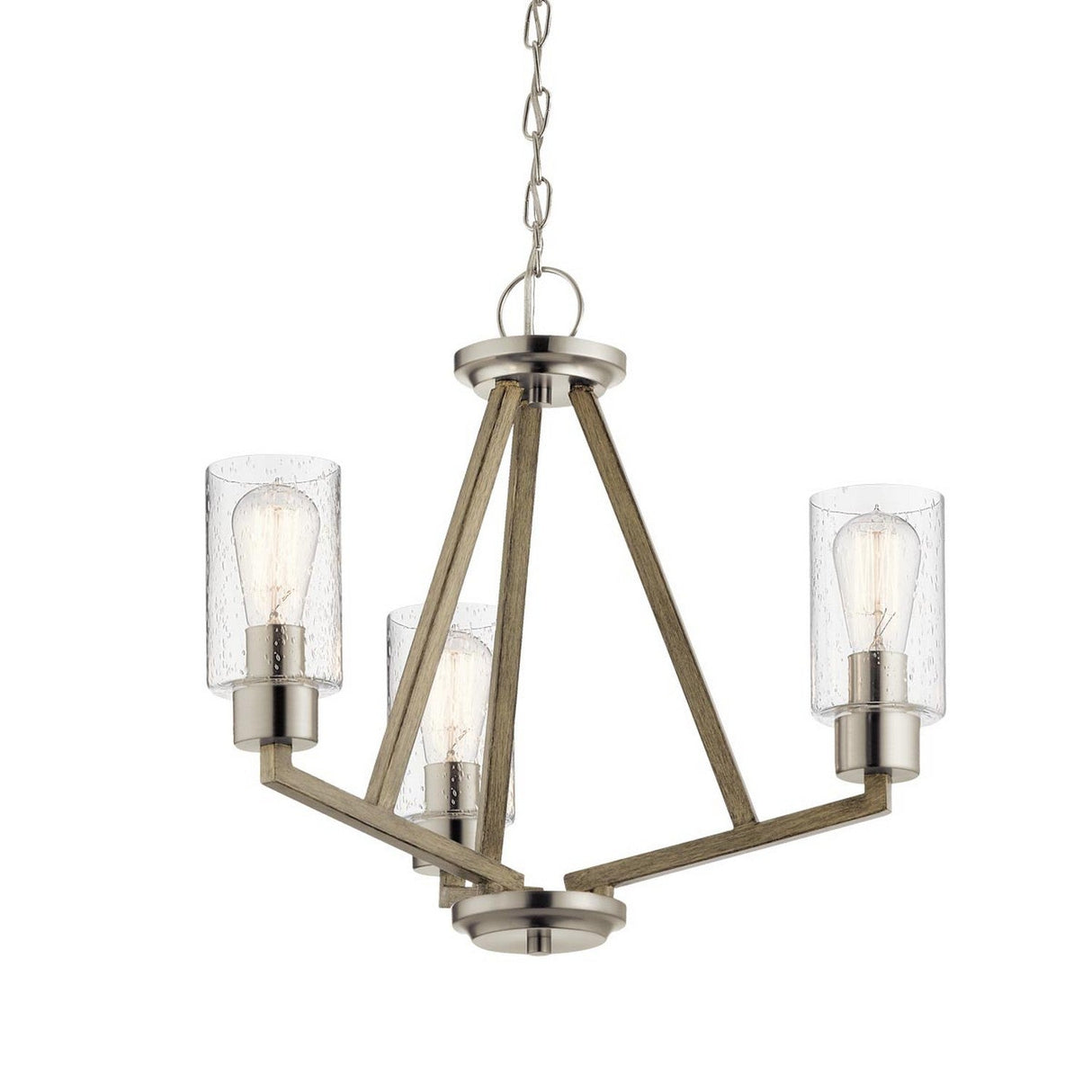 Introducing the Deryn 3 Light Chandelier in Antique Grey, a modern lighting fixture that exudes rustic charm. It features a triangular wooden frame and three lights encased in cylindrical glass shades. The chandelier hangs elegantly from a metal chain, blending contemporary design with an industrial flair.