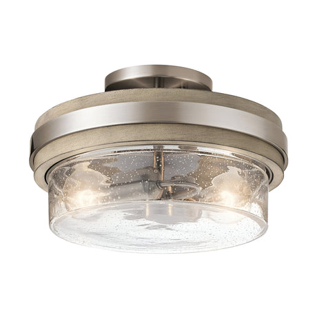 The Grand Bank 2 Light Semi Flush - Antique Grey offers a stylish and modern look with its circular design, brushed nickel finish, and antique grey accents. The clear, textured glass bottom enhances its vintage industrial charm by allowing light to shine through beautifully.