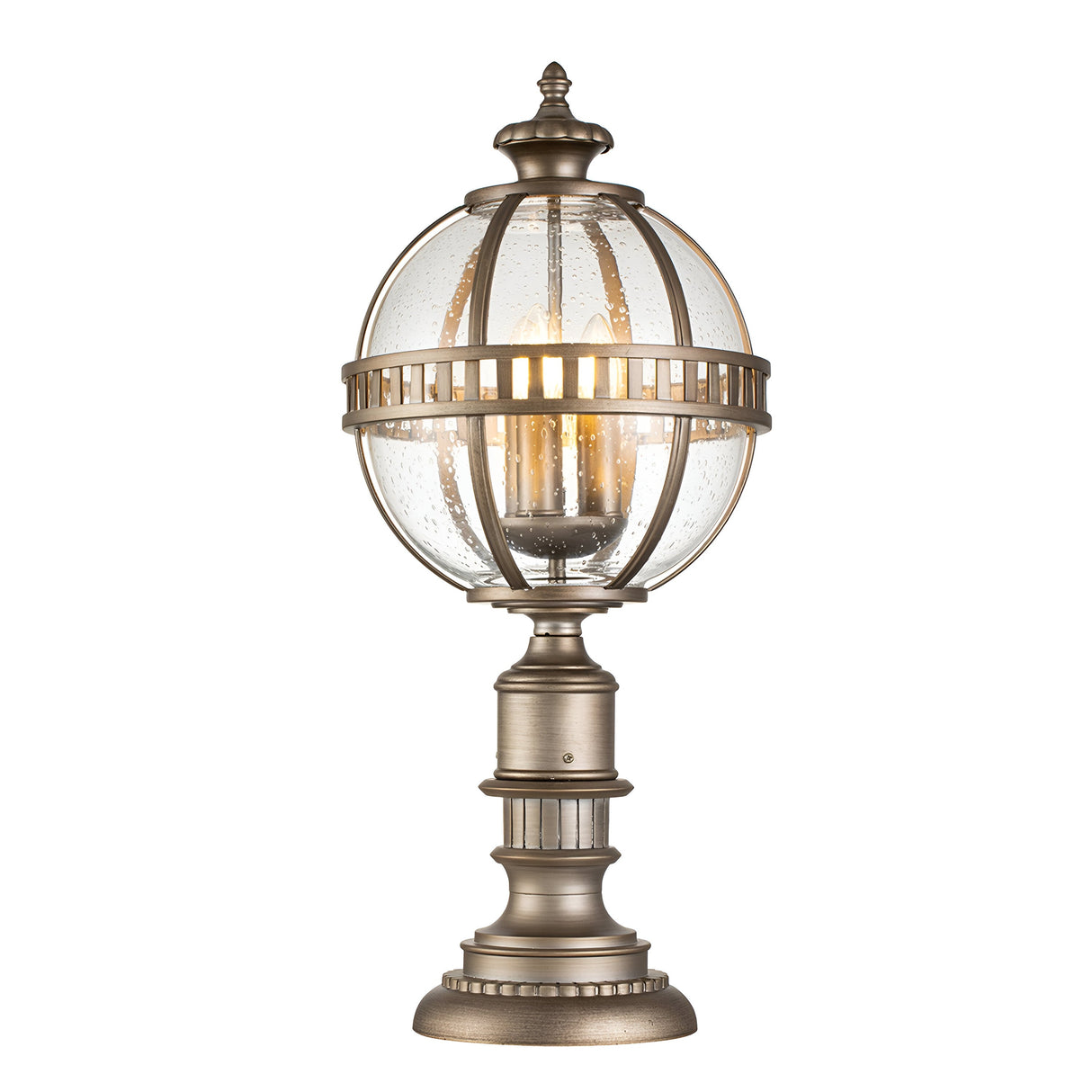 The Halleron Outdoor 3 Light Pedestal Pendant - Burnished Bronze captures the essence of the Victorian Era with its vintage-inspired design. It features a spherical glass lantern encased in a metal frame, showcasing visible light bulbs. The ornate base is complemented by a burnished bronze finish, making it an elegant addition to any outdoor area.