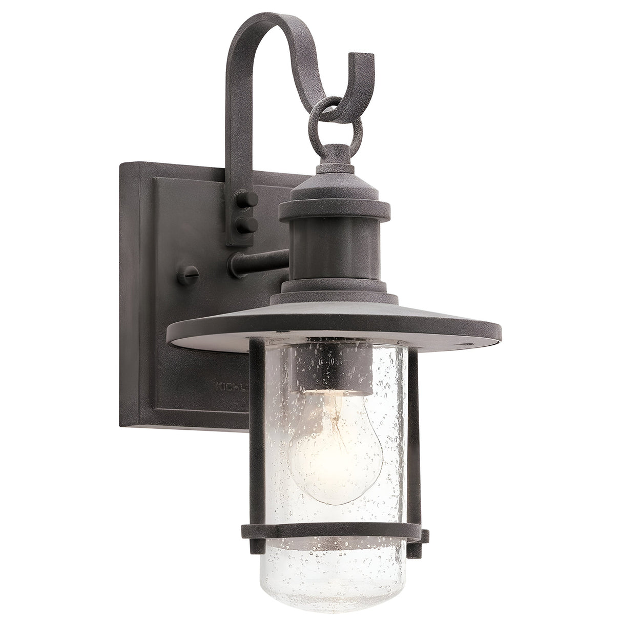 The Riverwood Outdoor 1 Light Wall Lantern in Weathered Zinc exudes rustic seaside vibes with its vintage-style design. It features a round top, a handle-like loop, and encloses an exposed bulb inside a cylindrical clear seeded glass case, making it perfect for adding nautical inspiration to your space.