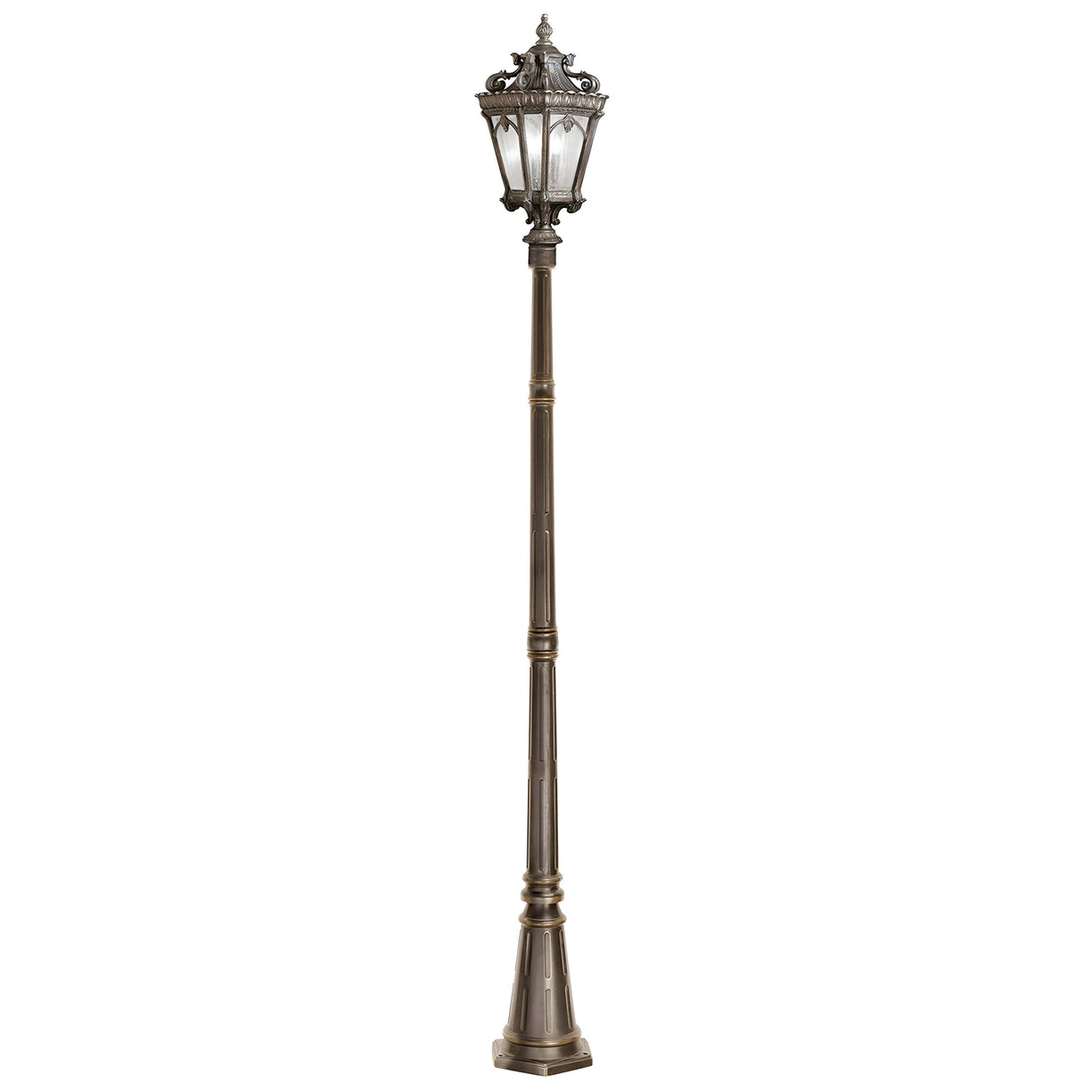 The Tournai 3 Light Extra Large Lamp Post in Bronze features an ornate lantern atop a sturdy metal pole, standing upright. This outdoor fixture showcases decorative details and a classic design, bringing vintage charm to any setting.