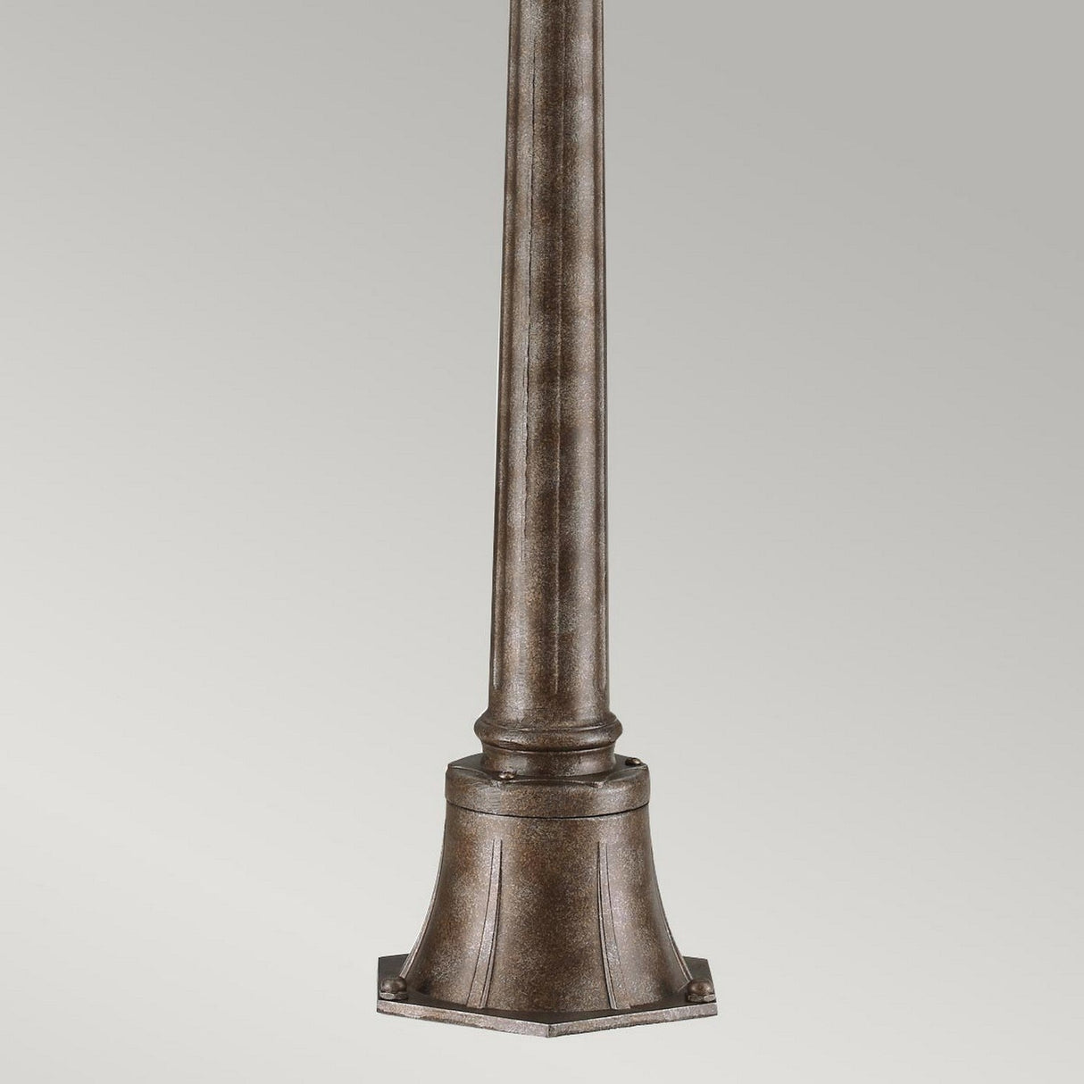 A bronze-colored Tournai 1 Light Medium Pillar crafted from hand-cast aluminum showcases a cylindrical structure with a flared base, set against a gradient gray background. It features a simple, smooth design with a slightly tapered top and sturdy square base, making it an ideal choice for bronze outdoor lighting solutions.