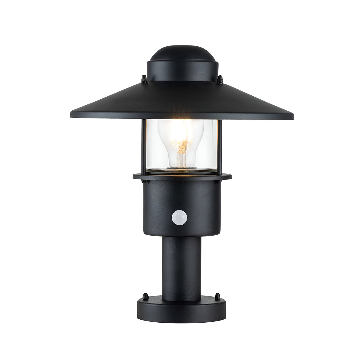 The Klampenborg 1 Light Pedestal with PIR - Black is a modern outdoor security lantern that features a wide, conical top and clear glass housing to showcase the glowing bulb. It is mounted on a short cylindrical base, boasting a minimalistic design while incorporating a discreet PIR sensor for increased security.