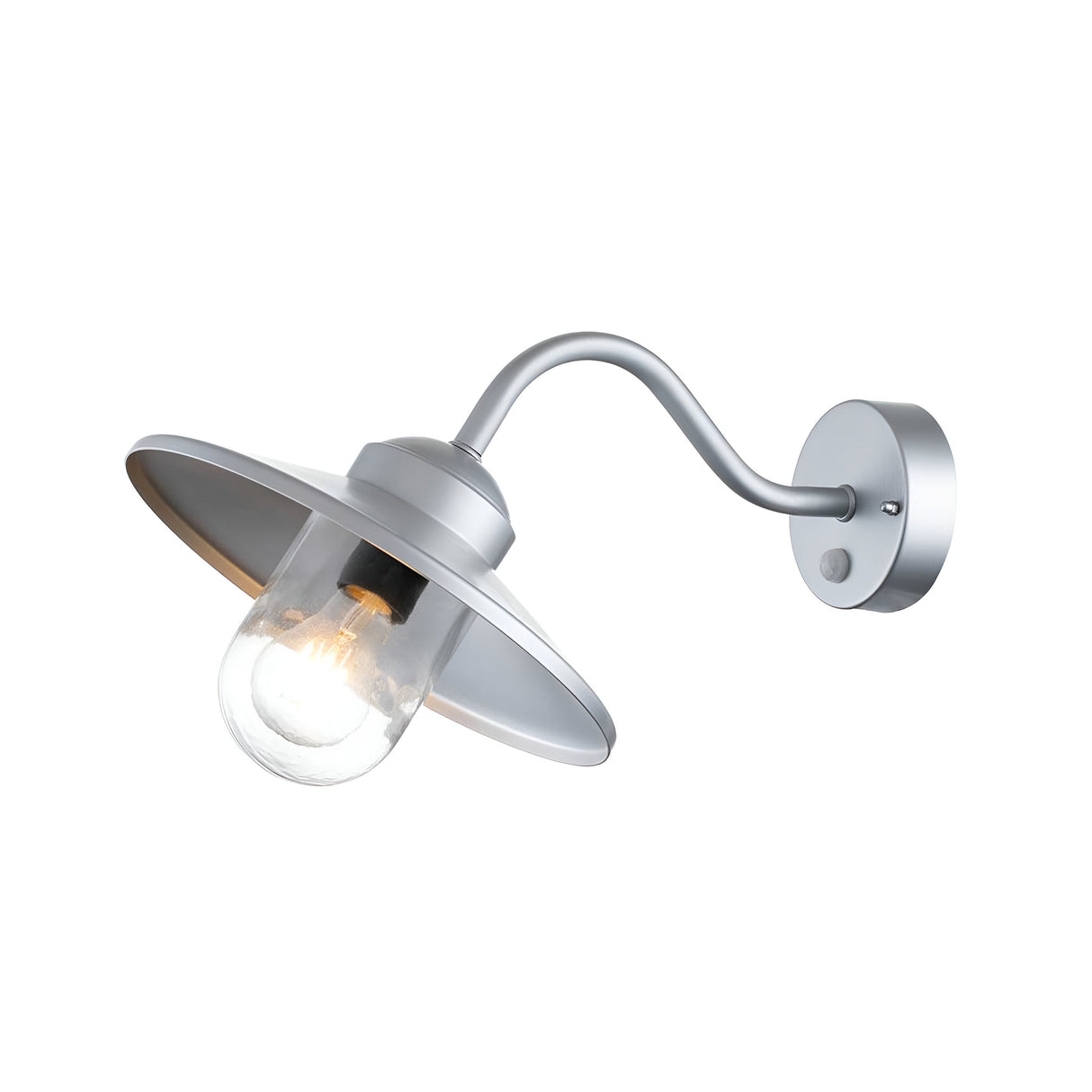Introducing the Klampenborg 1 Light Outdoor Wall Light with PIR - Silver: This stylish fixture features a curved stainless steel arm and a wide, flat shade. The bulb is encased in clear glass, providing a warm glow. Its modern and minimalist design makes it perfect for both indoor and outdoor environments.